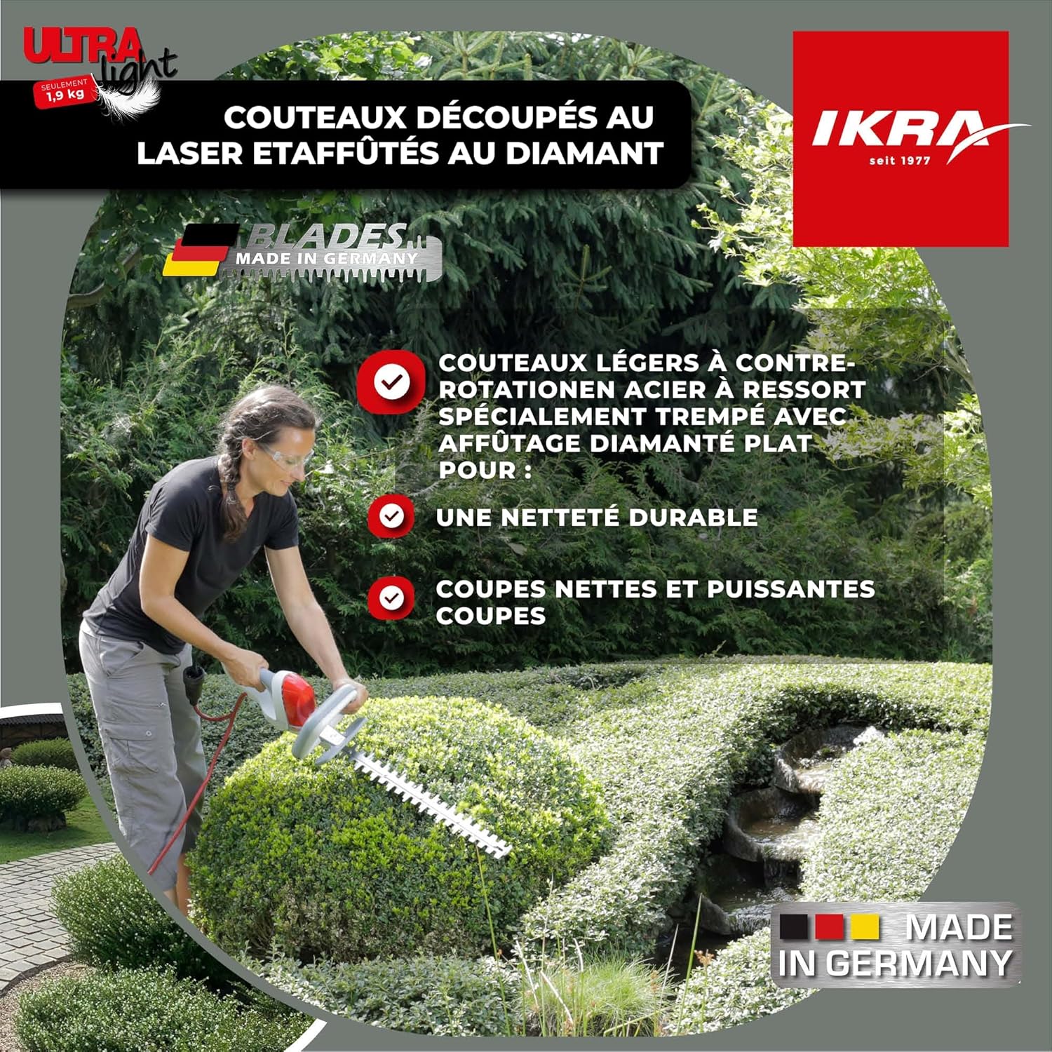 User trimming a hedge with the IKRA FHS 1545 hedge trimmer