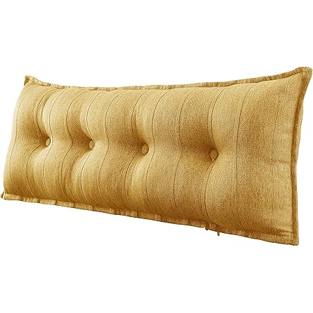 yellow bed rest pillow