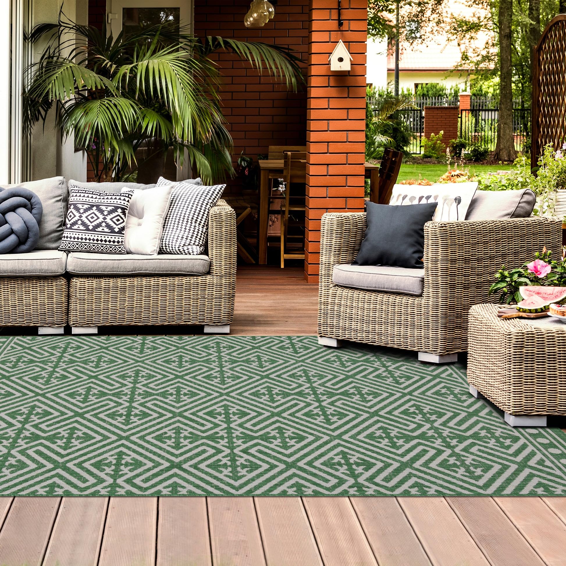 The homeart 80x150cm Green Cream Medallion outdoor rug offers a stylish and practical solution for your patio or balcony.