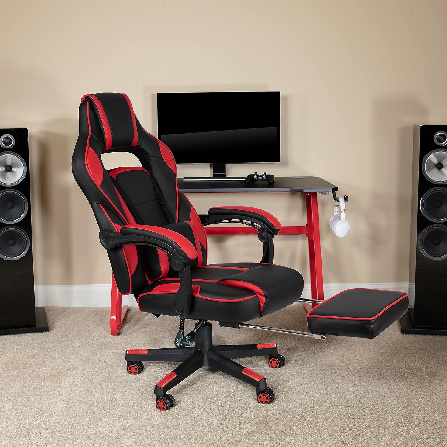 Flash Furniture X40 Gaming Chair with footrest extended in a room with a gaming setup