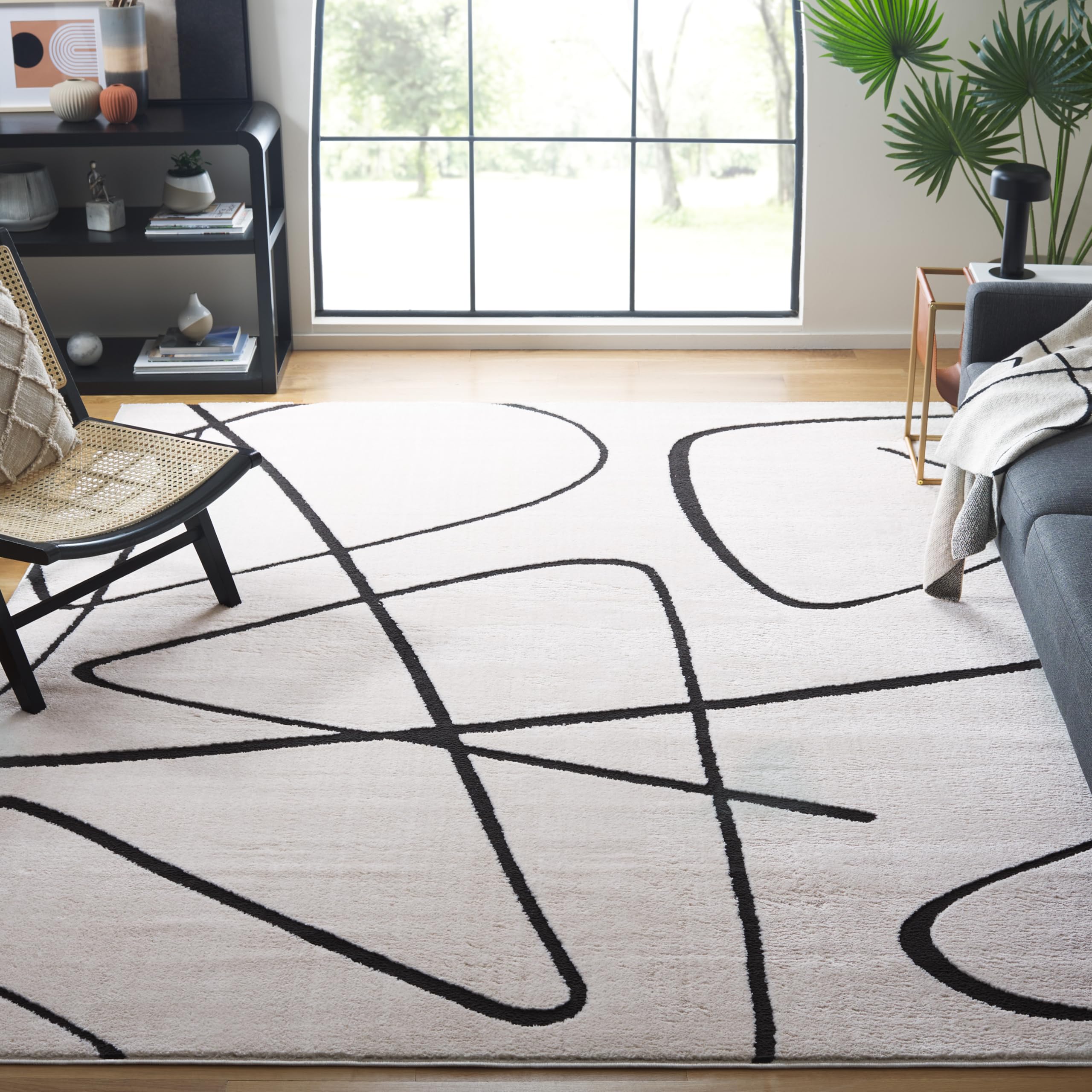 SAFAVIEH Melody Collection Area Rug - 9' x 12', Ivory & Black, Modern Design, Non-Shedding & Easy Care, Ideal for High Traffic Areas in Living Room,