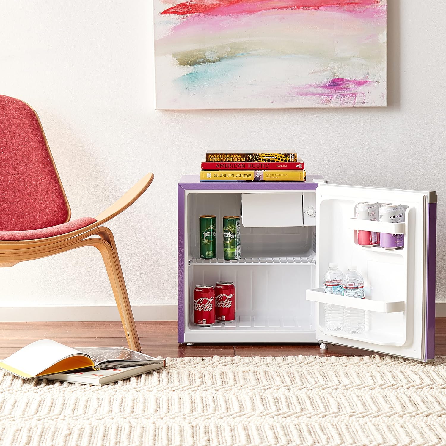 Interior view of the RCA RFR160 compact refrigerator showing shelves and door storage.