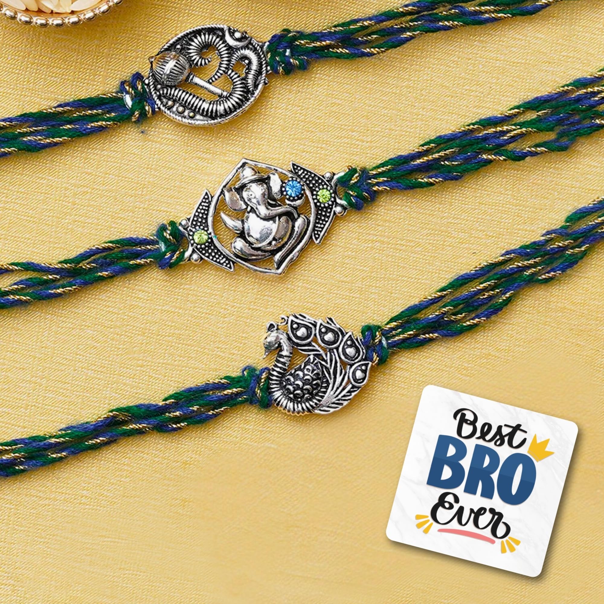 eCraftIndia Set of 3 Lord Ganesha, Peacock, Om with Mace Rakhis, Best Bro Ever Fridge Magnet with Roli Chawal Pack - Rakhis for Brother, Bhabhi, Kids