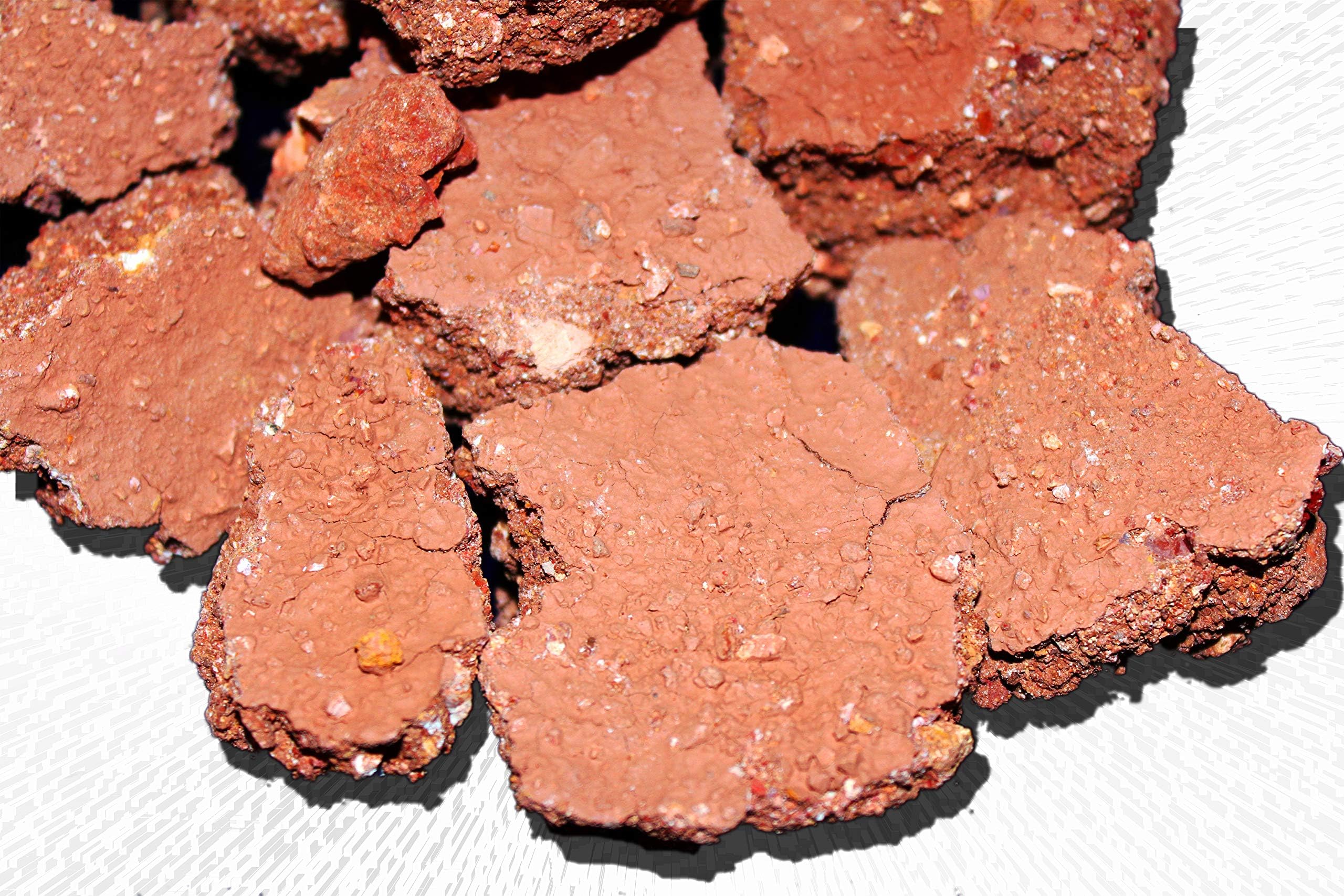 Earthy clay dirt chunks with multicolor clay pieces throughout. Pure and clean clay soil