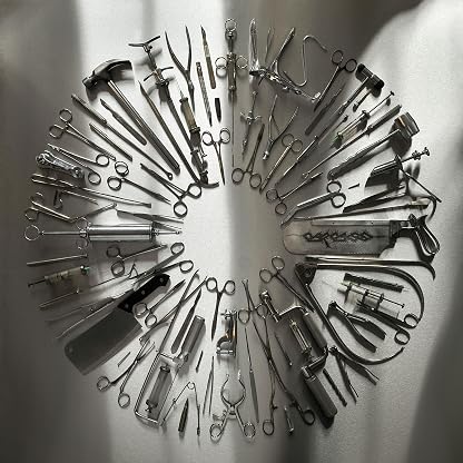 Surgical Steel (10th Anniversary) - Red & Black Splatter por Carcass, capa do álbum