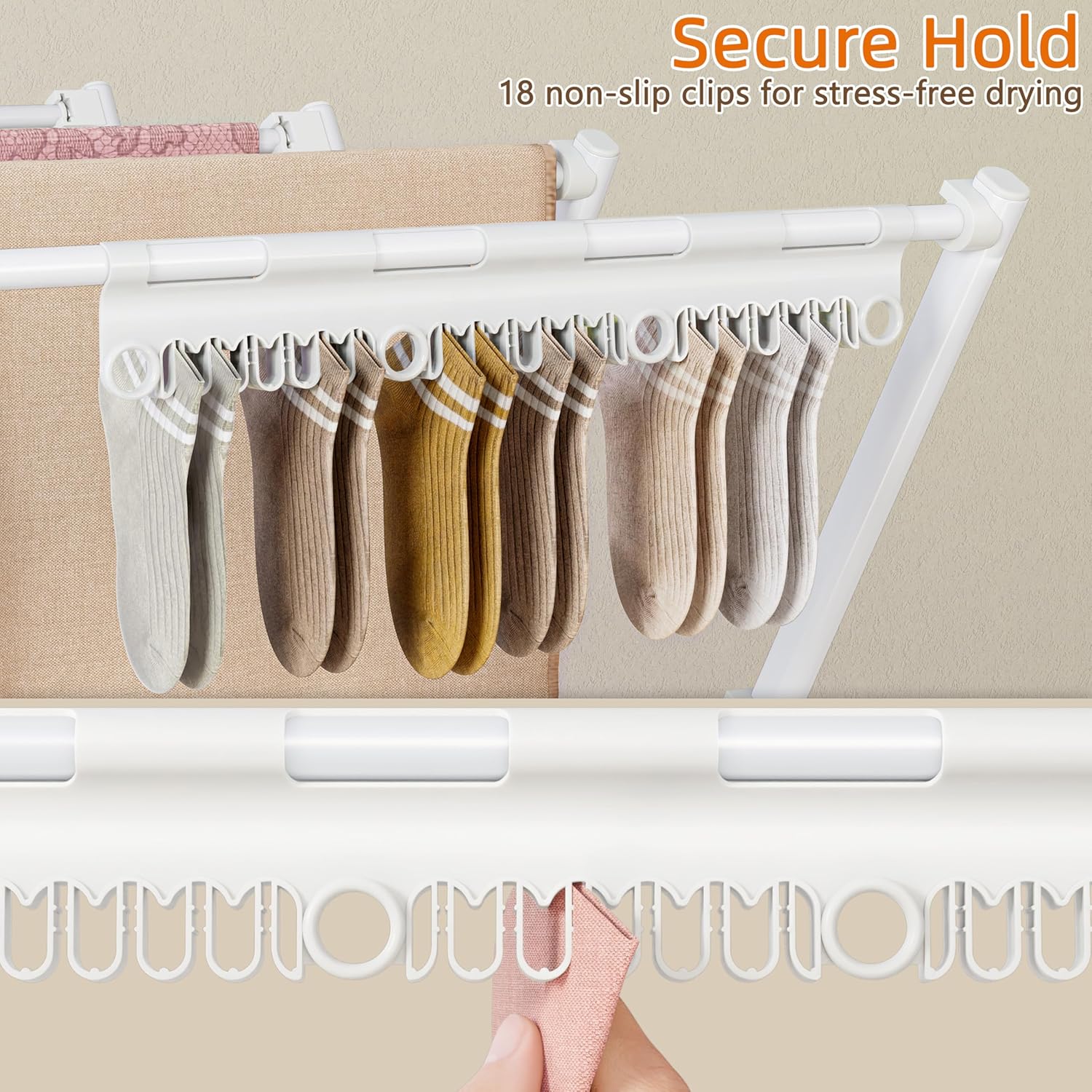Close-up view of the integrated sock clips on the HOMIDEC drying rack, holding multiple pairs of socks securely.