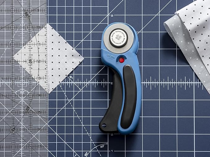 Olfa rotary cutter, acrylic rulers, and self healing cutting mat