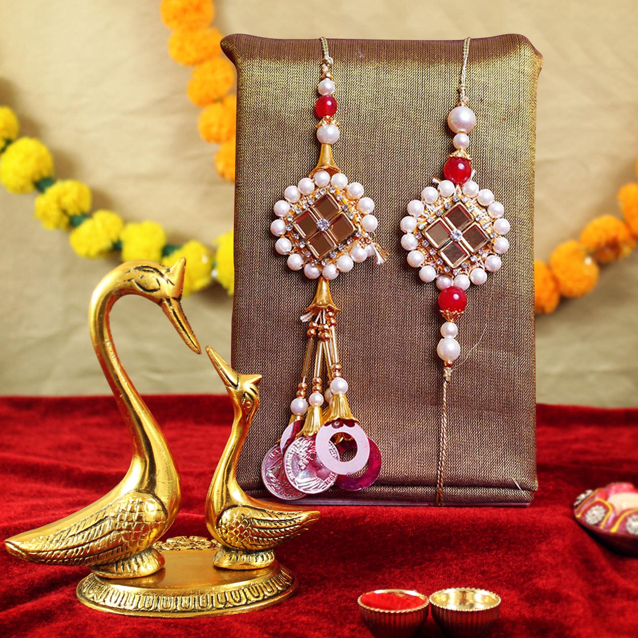 TIED RIBBONS Rakhi for Brother and Bhabhi with Gift Pack - Lumba Rakhi Set for Bhaiya Bhabhi with Mini Greeting Card, and Brass Showpiece (B099PMXY29) Amazon Price History, Amazon Price Tracker