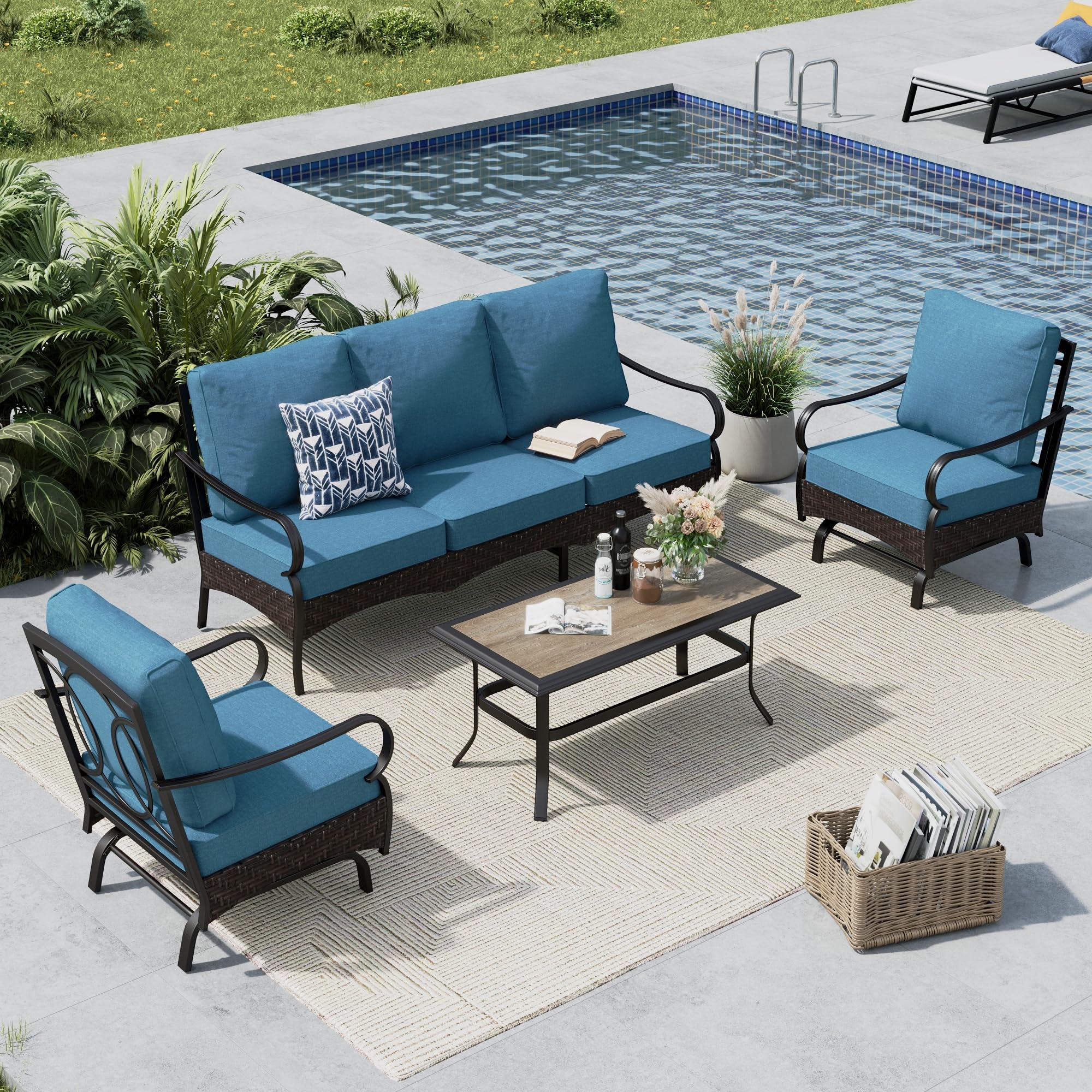 Assembled MFSTUDIO 4-piece outdoor patio furniture set in Navy Blue, showing the three-seat sofa, two rocking single sofas, and coffee table.