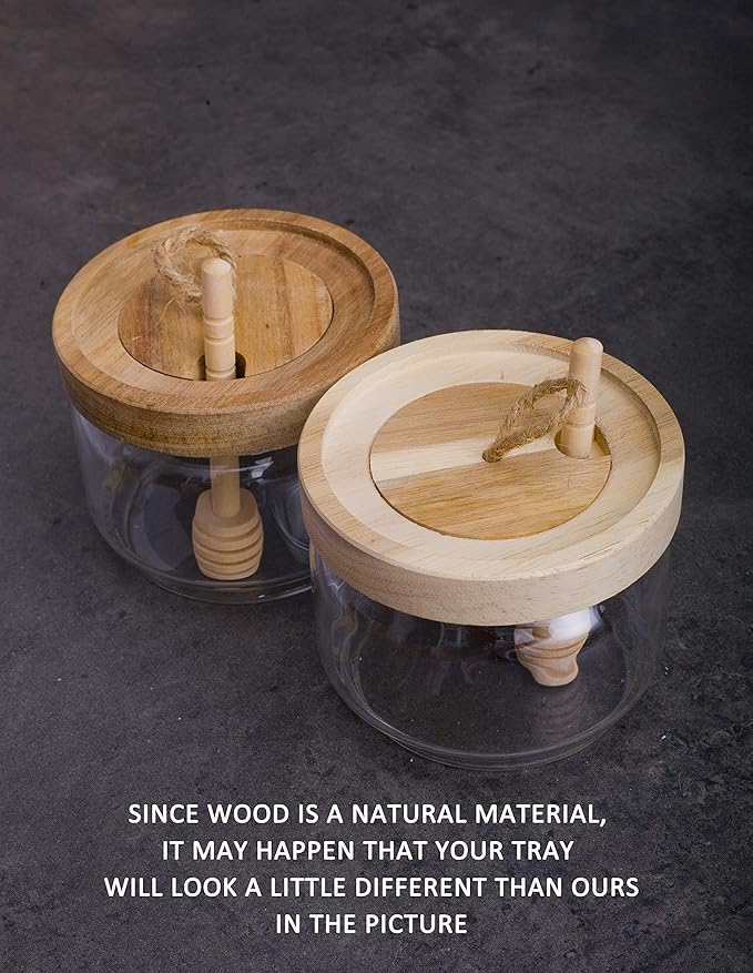 If you're searching for the perfect gift for foodies, home cooks, or anyone who appreciates good quality, this honey pot and drizzler set is an excellent choice. It combines practicality and elegance, making it a must-have addition to any kitchen. Elevate your honey experience with the Honey Jar Pot Glass Holder Dispenser Set. Description by ChatGPT.