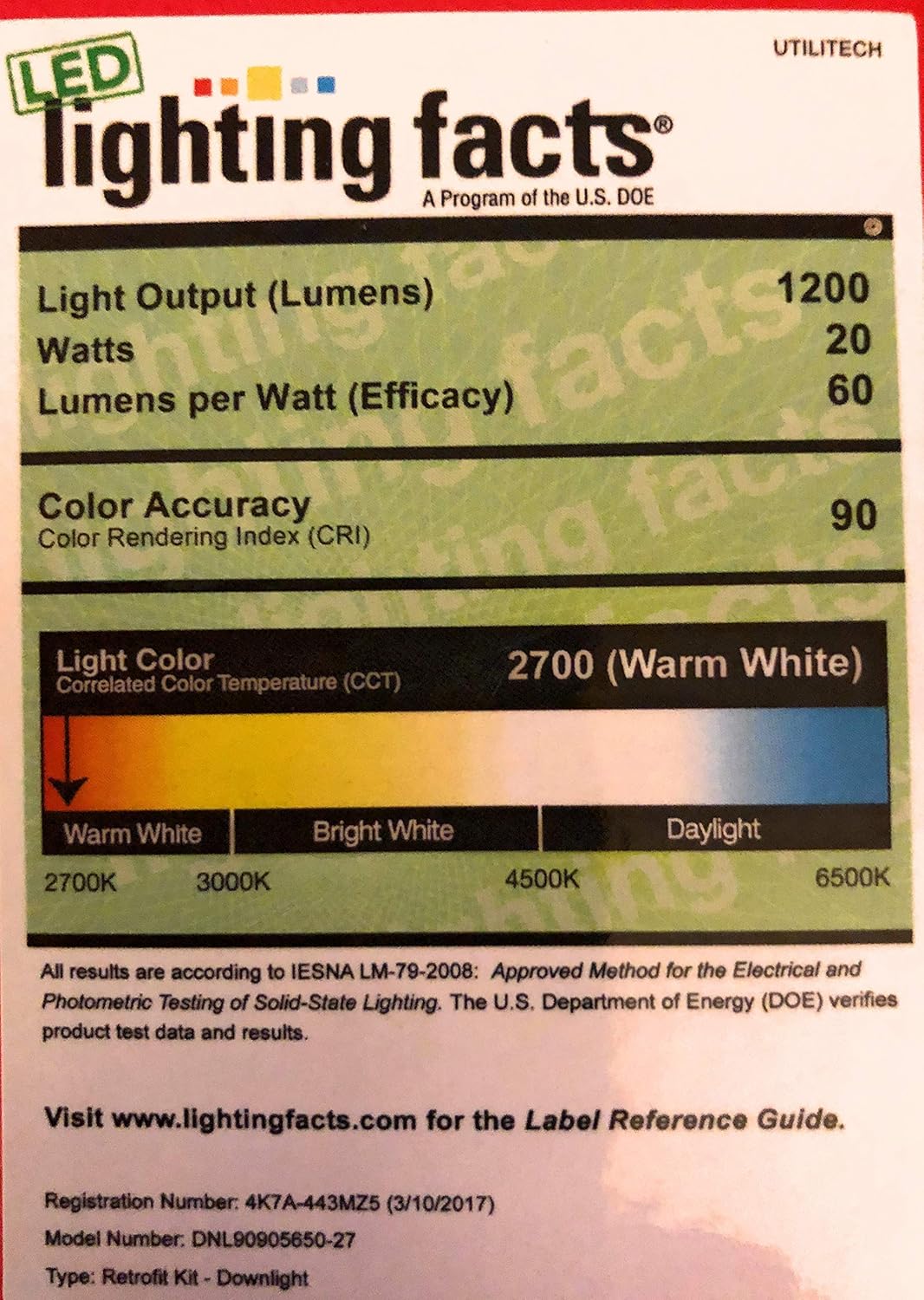 Lighting facts label for Utilitech LED Downlight showing 1200 lumens, 20 watts, 60 lumens per watt, 90 CRI, and 2700K Warm White color temperature.