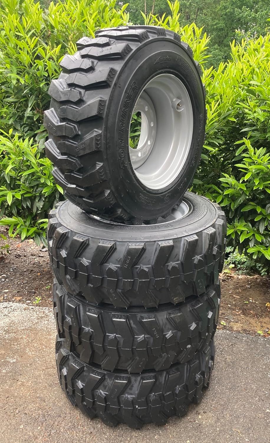 Set of 4-12-16.5 Forerunner SKS-1 Skid Steer Tires on Silver Wheels/Rims (8 lug) for Gehl, Thomas, Daewoo, Volvo, Scat Track & more - 14PLY -12X16.5