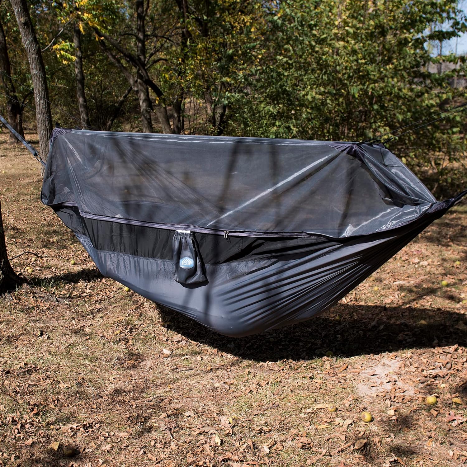 packed portable mosquito hammock showing integrated stuff sack and compact size in backpack