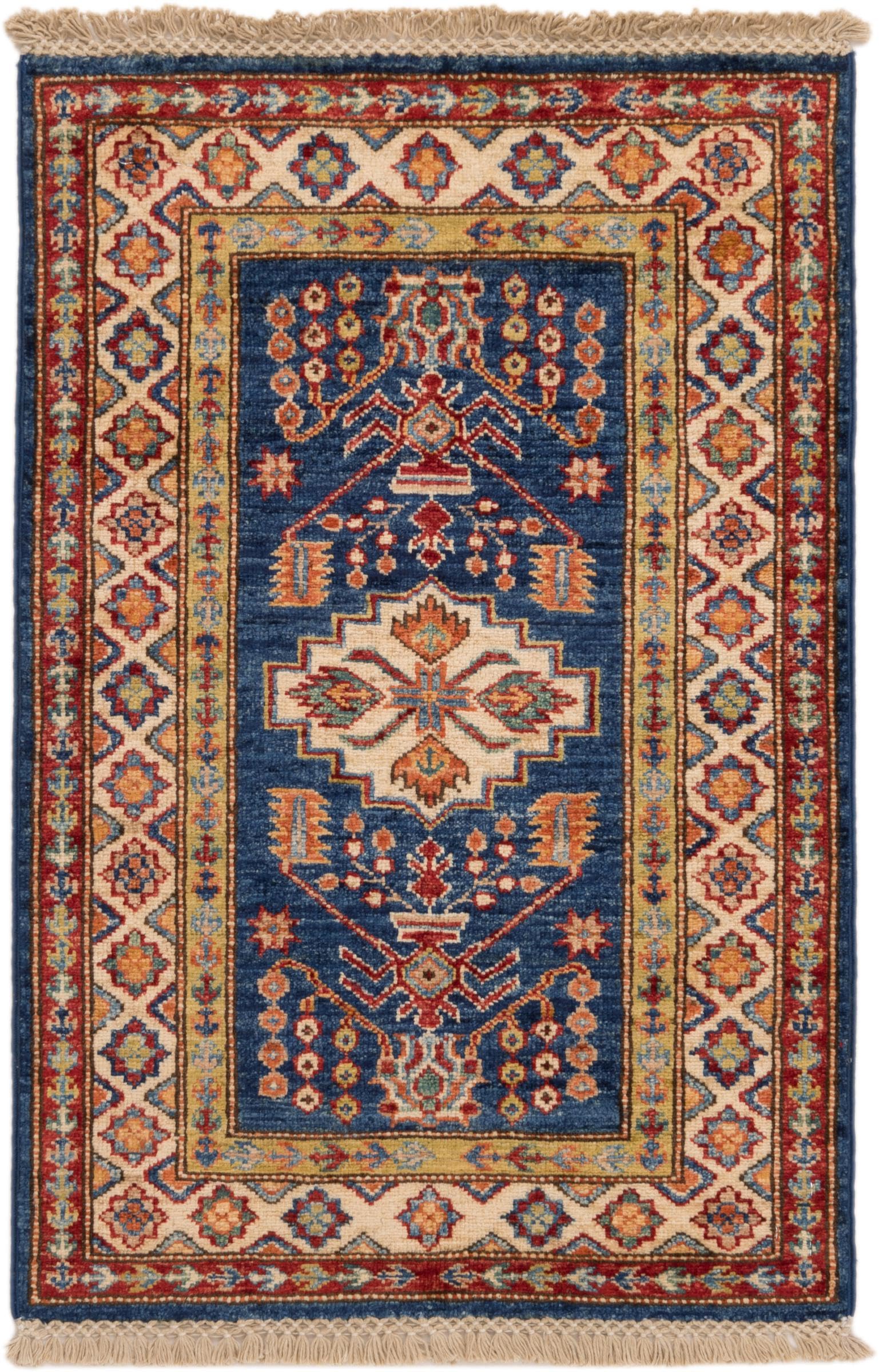 Tapis d'Orient Kazak noué main l'histoire de la laine pakistanaise chez vous