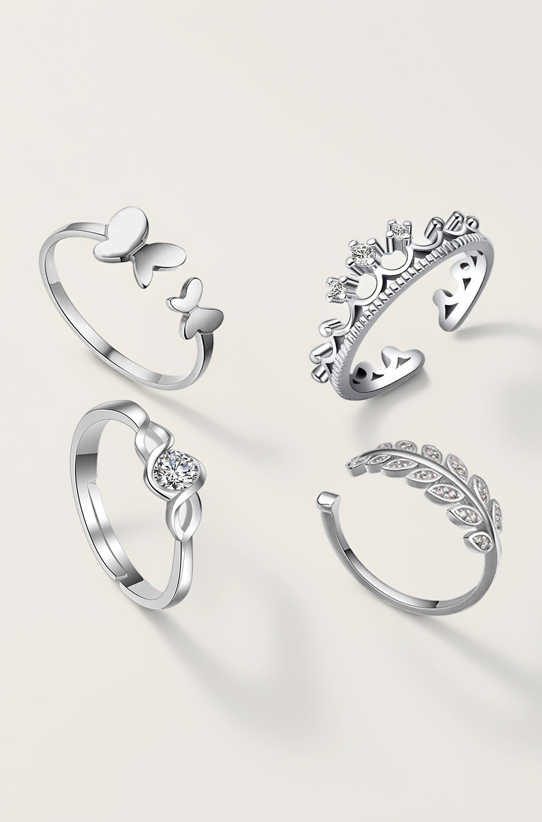 Rhodium Plated Combo Of 4 Adjustable Finger Rings Studded With White Crystal Stones For Girls And Women CO1000390