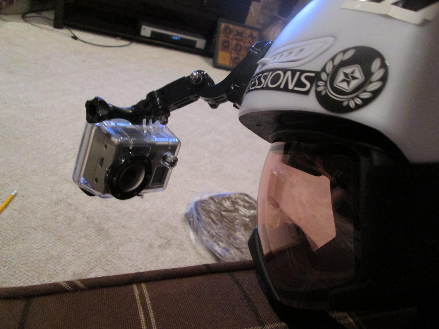 GoPro HD Hero 960 mounted on the side of a helmet