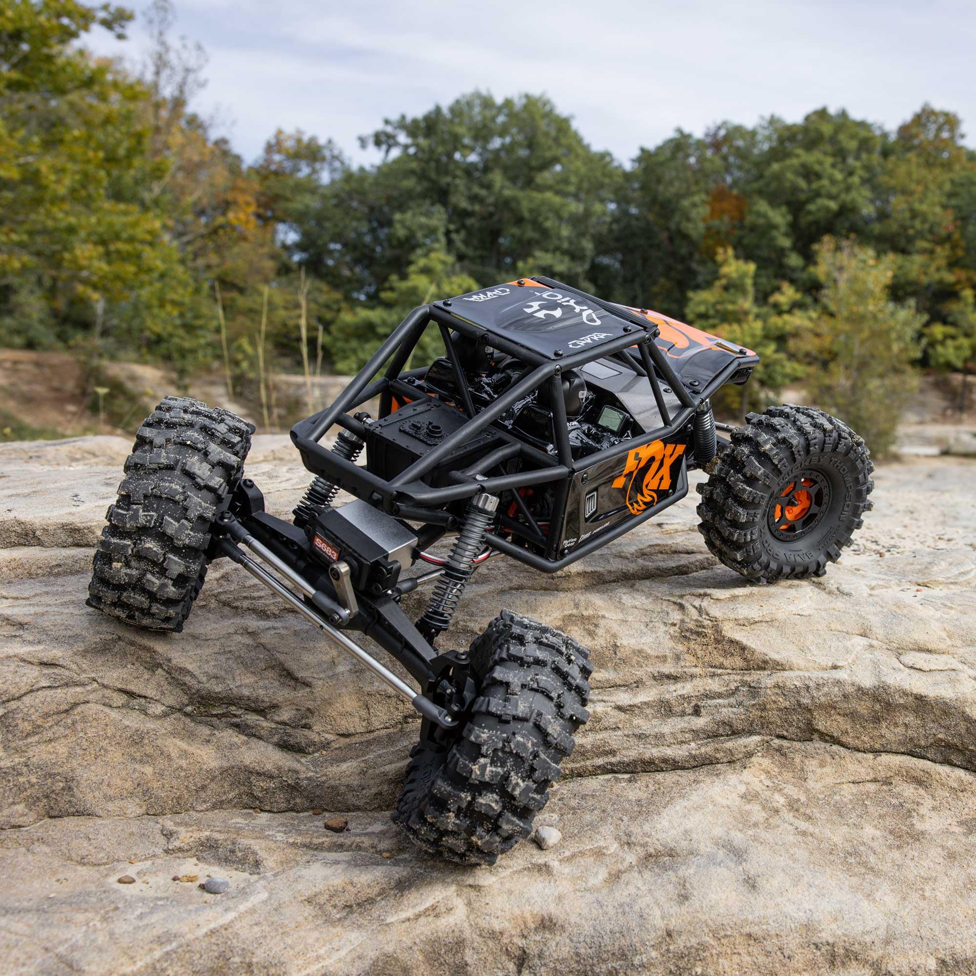 Axial 1:10 UTB10 Capra 1.9 4WS 4x4 Ready to Run Rock Crawler - Coche Todoterreno teledirigido, Motor de Cepillo, sin batería ni Cargador, Color Naranja