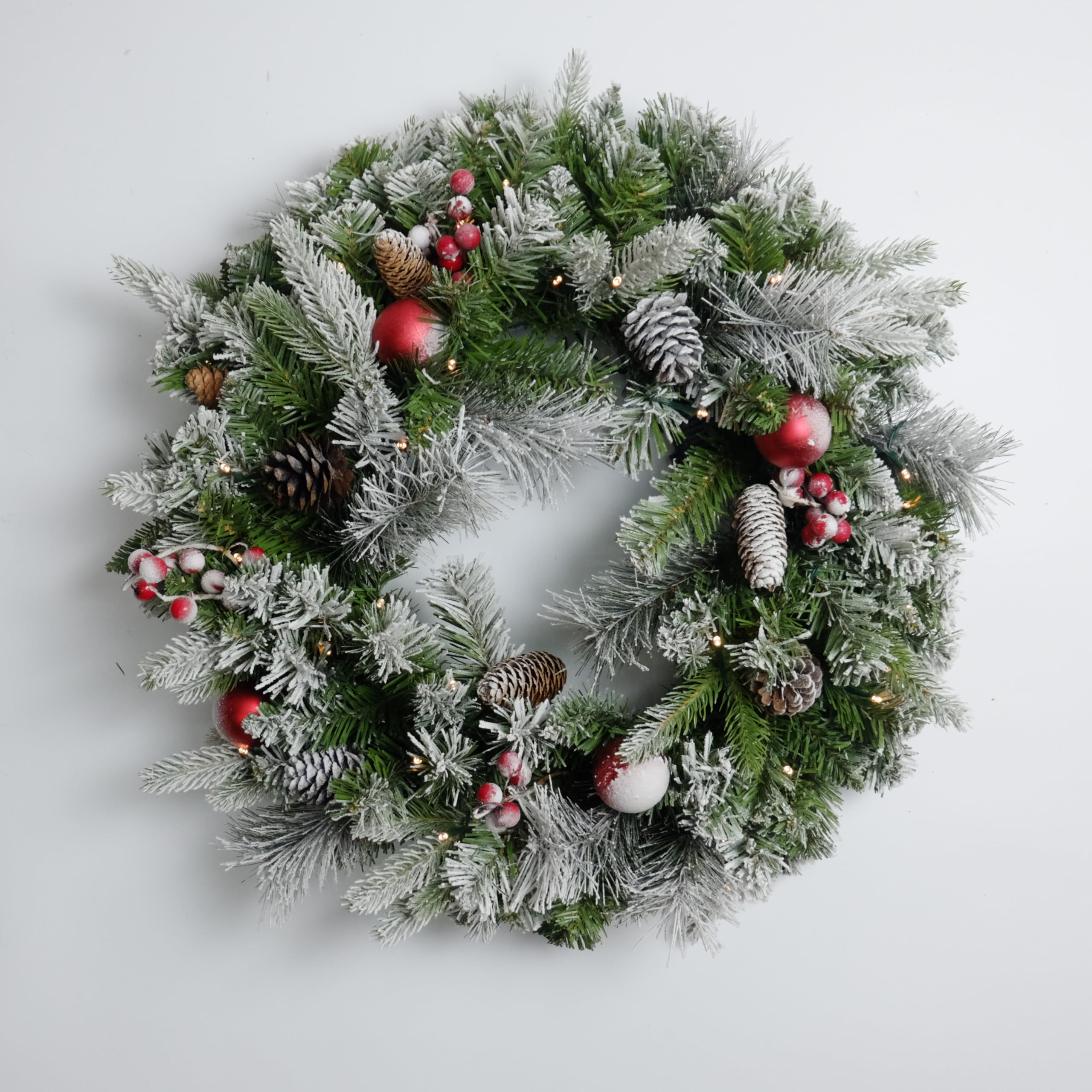 Couronne de Noël floquée pré-éclairée de 61 cm avec 50 pommes de pin lumineuses et boules rouges pour porte d'entrée avec lumières, couronne de Noël pour décoration de Noël, porte, fenêtre, mur (vert)