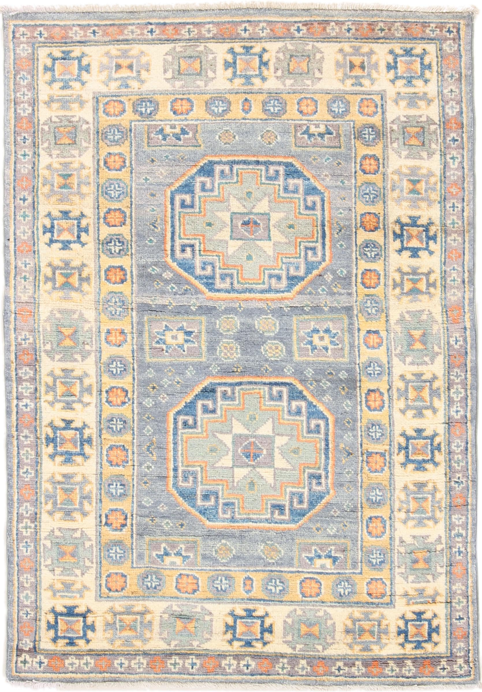 Tapis laine Pakistan Kazak pour réchauffer l'ambiance de votre salon