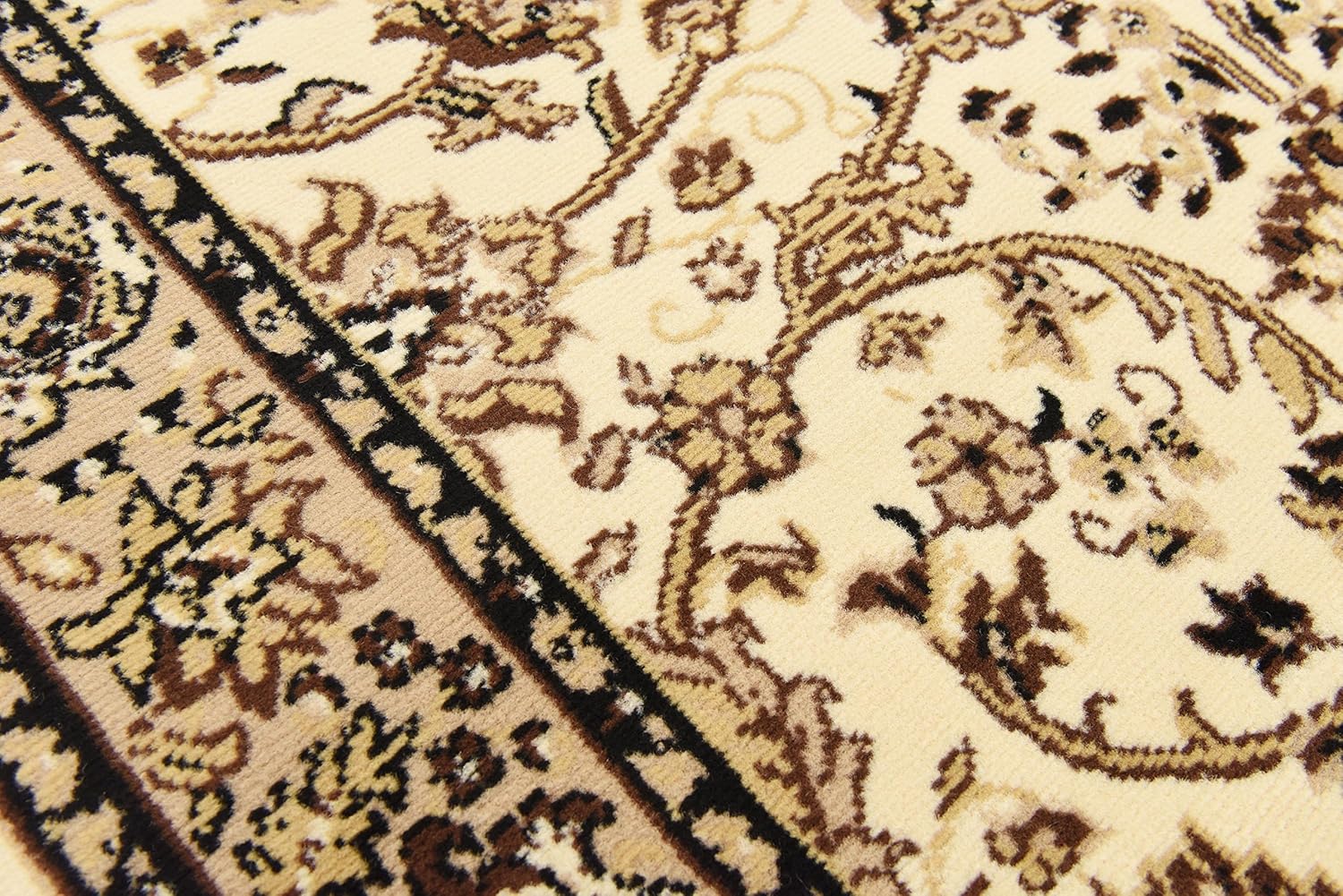 Ivory and Tan 4' x 6' Stain-Resistant Synthetic Area Rug