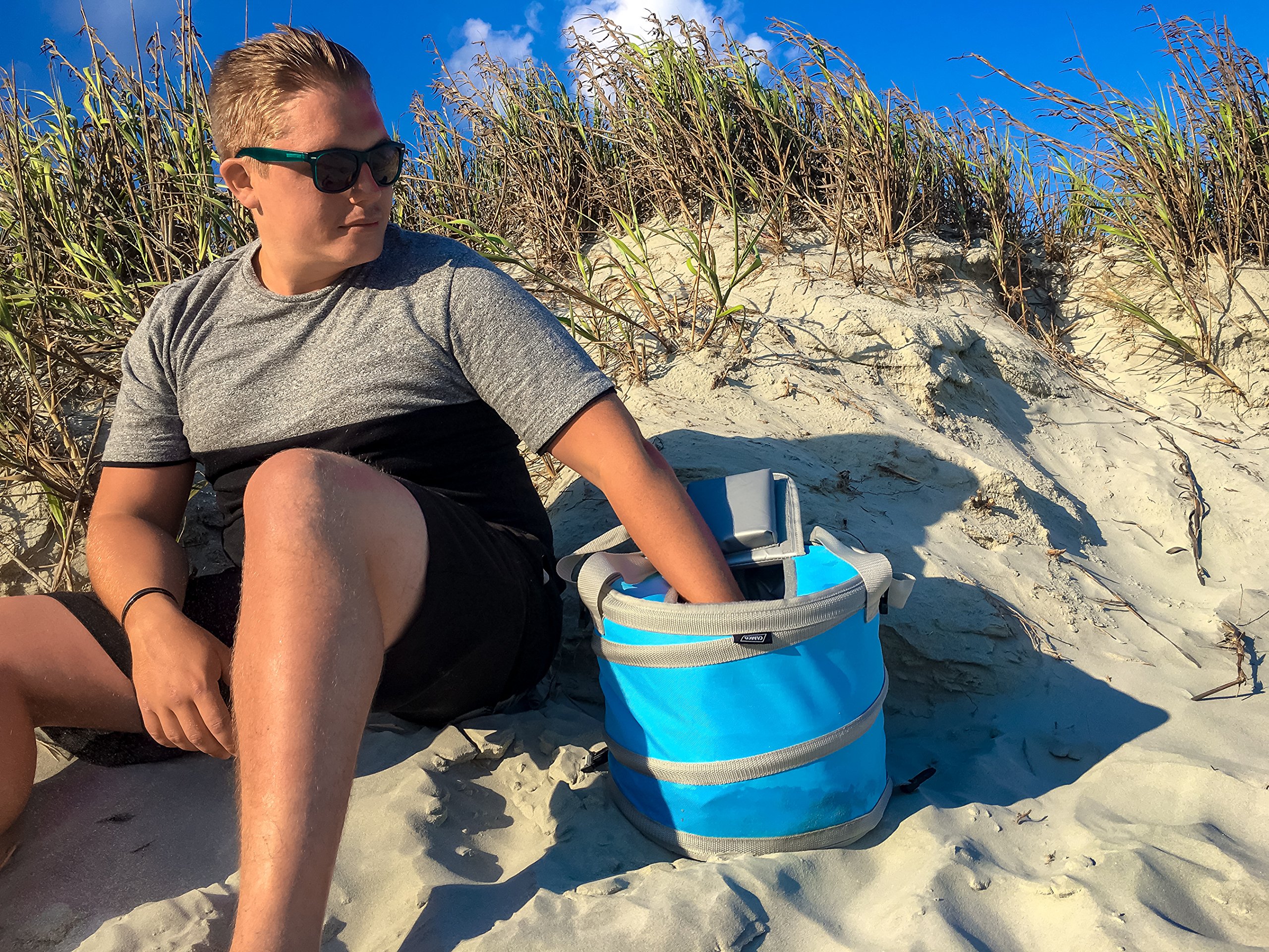 Camco Wyskakująca lodówka | lekka, wodoodporna i izolowana wyskakująca otwierana do użytku i składana na płasko do przechowywania, idealna na plażę, basen, kemping, klapę tylną i podróż | niebieska