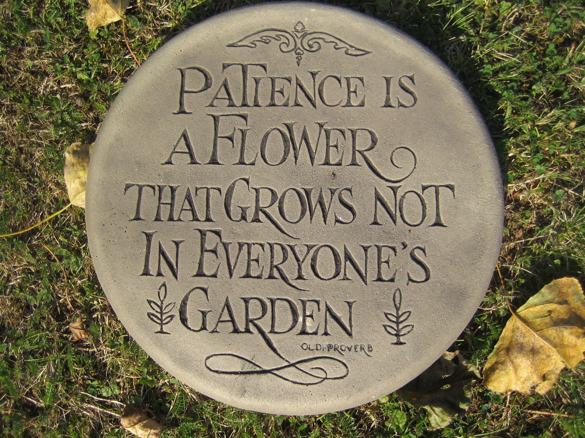 Patience Stepping stone garden ornament