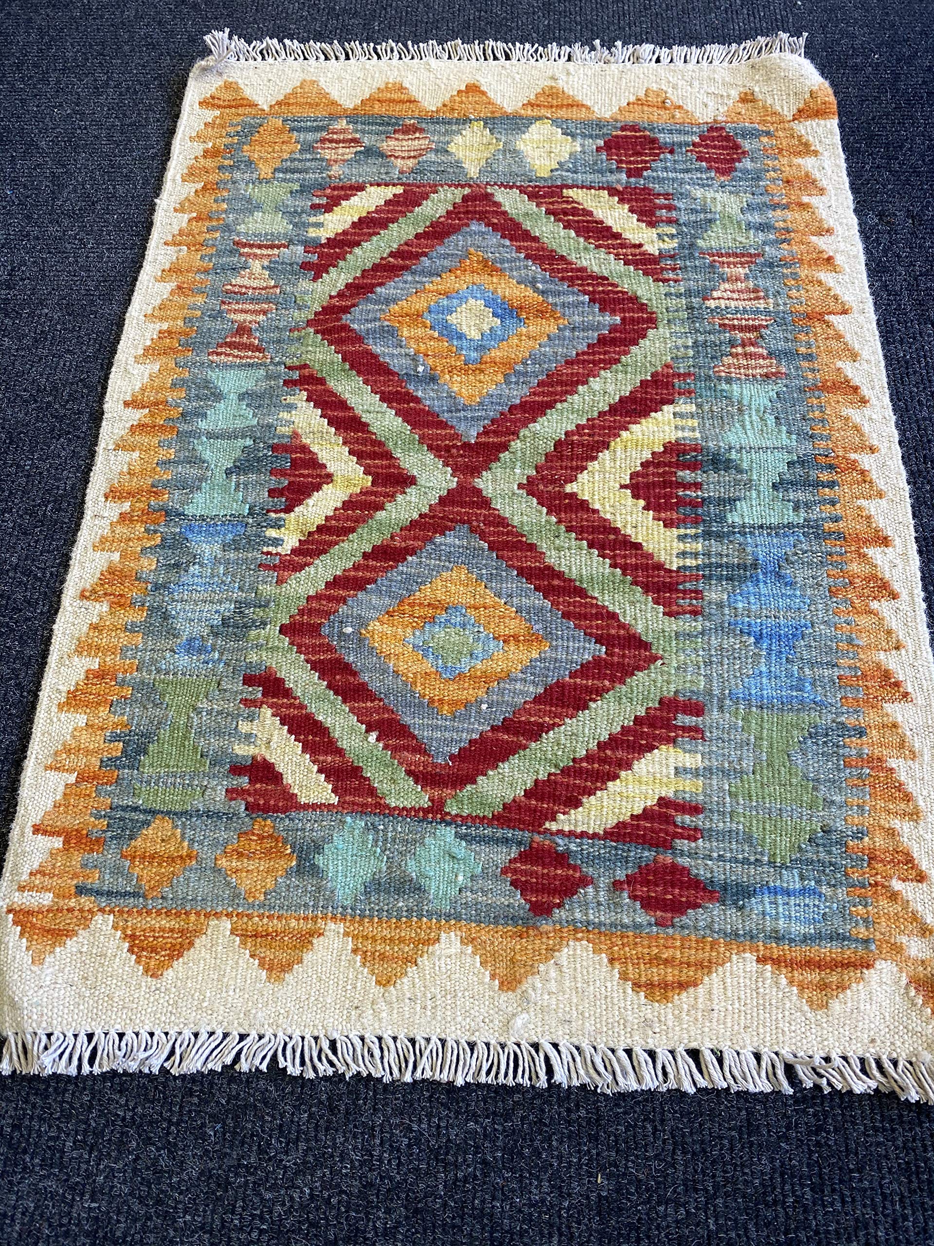 Kilim afghan oriental nappe tisse main tapis table geometrique colorant vegetal