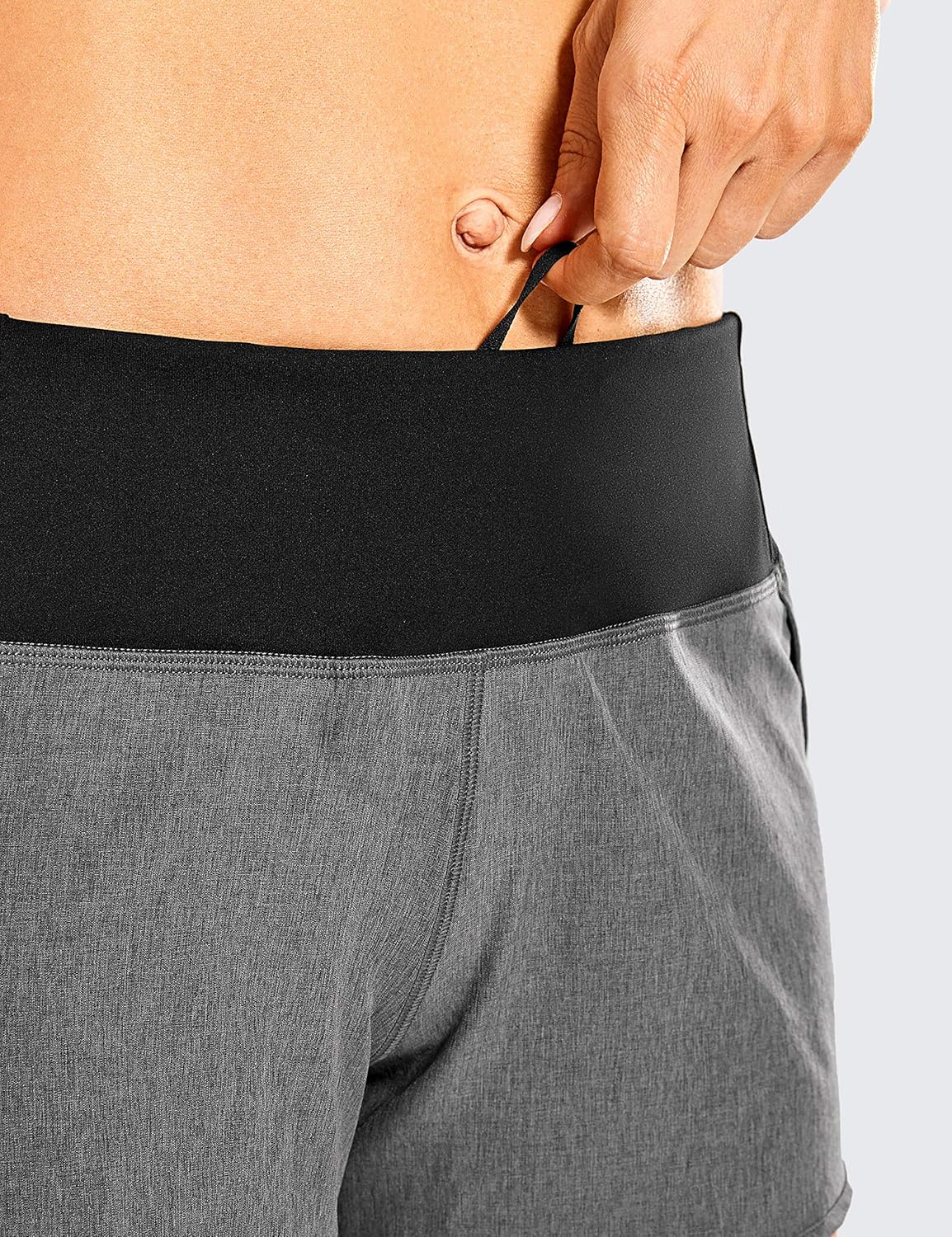 CRZ YOGA Mid Waisted Running Shorts for Women - 4'' Liner Gym Athletic Workout Shorts with Pockets Soft Lightweight Heathered Black X-Small