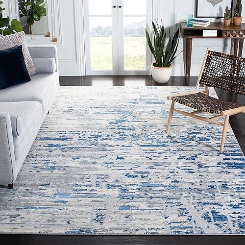 SAFAVIEH Jasper Collection - Alfombra de área de 9 x 12 pies, marfil y azul, diseño abstracto moderno, no desprende pelusa y de fácil cuidado, ideal