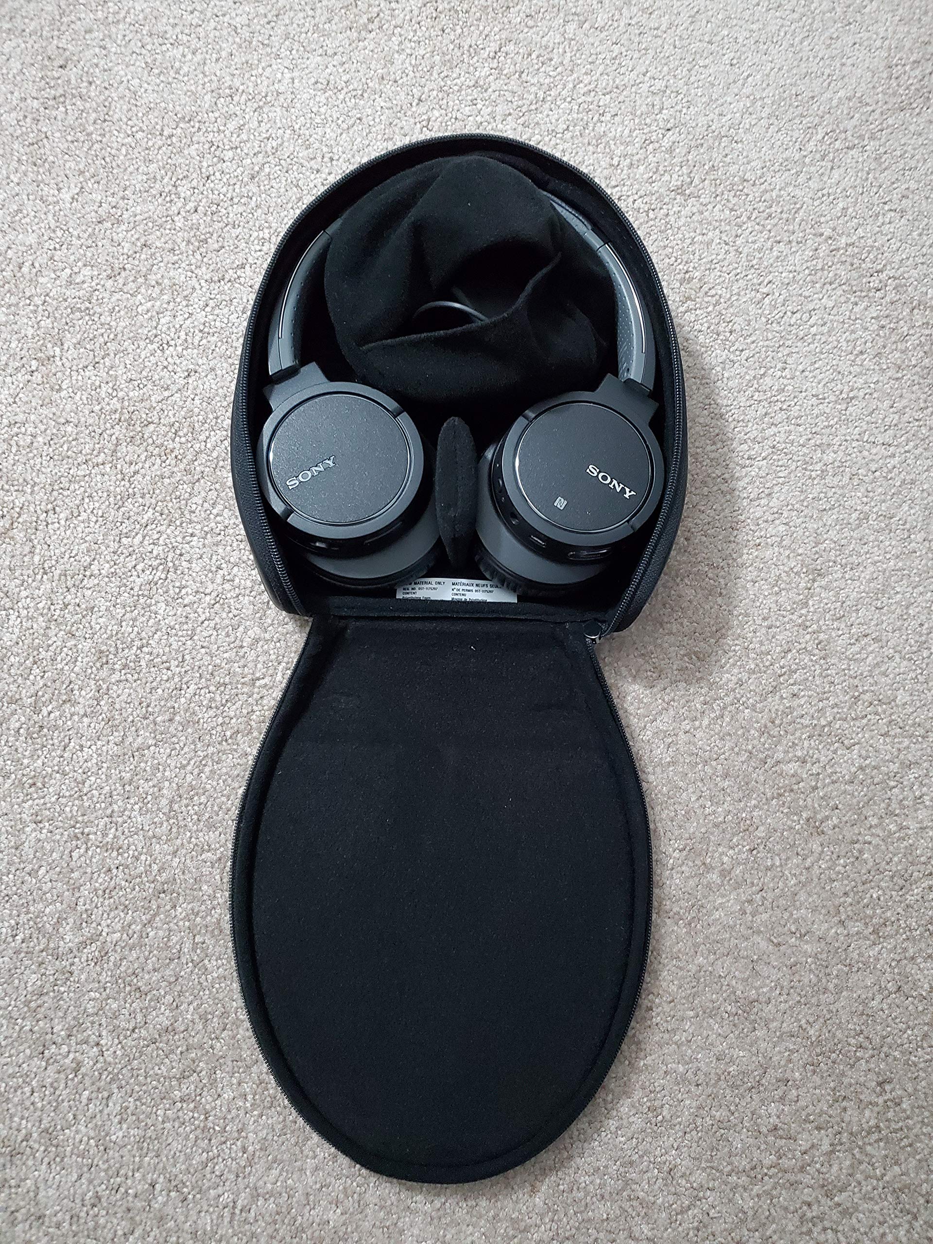 black bluetooth noise canceling headphones with case