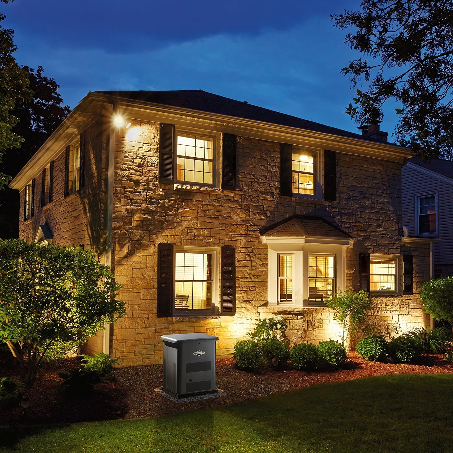 Briggs & Stratton 40451 generator installed next to a house in a landscaped yard