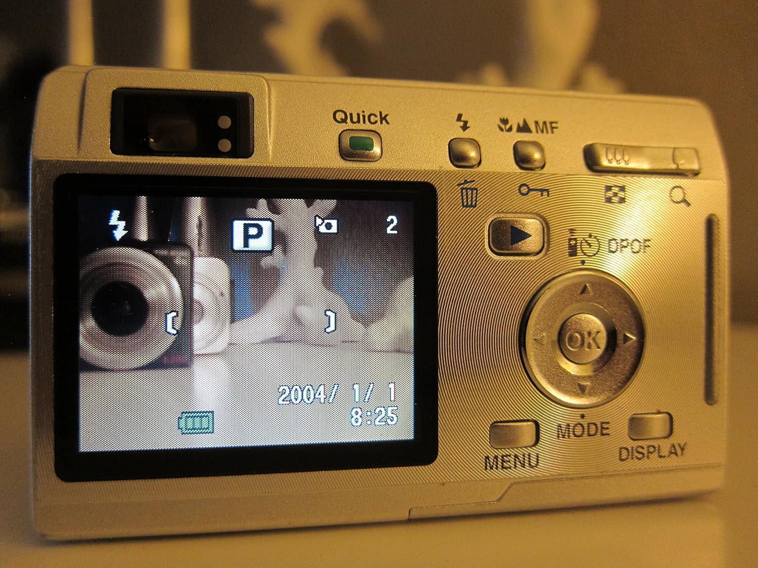 Rear view of Pentax Optio S4i camera showing LCD screen in shooting mode
