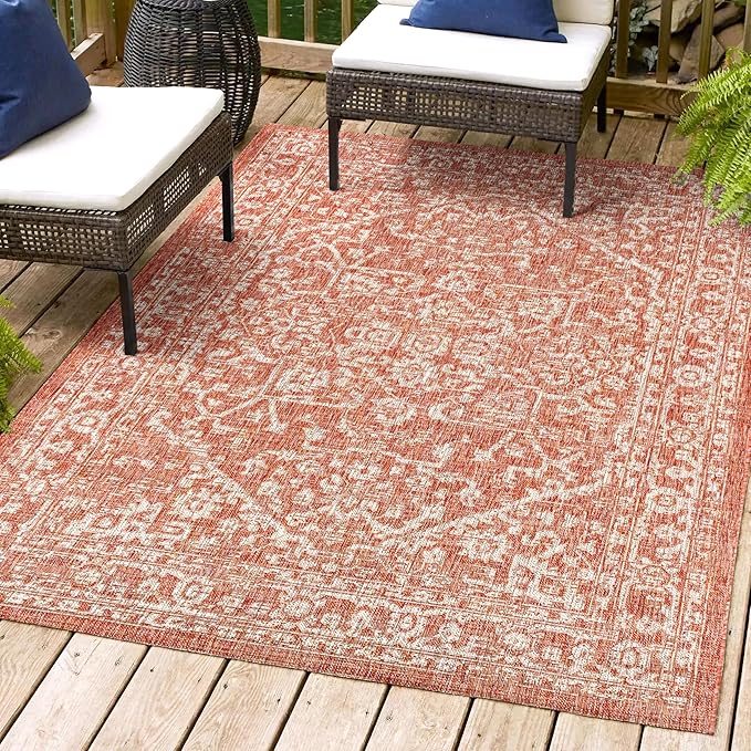 The Jonathan Y 4x6 Medallion Textured Indoor/Outdoor Area Rug in Red/Taupe is a stylish and versatile rug that can be used both indoors and outdoors. The rug measures 4x6 feet, making it the perfect size for a variety of spaces such as living rooms, patios, or entryways. The rug features a beautiful medallion pattern in red and taupe colors, adding a pop of color and design to any room.