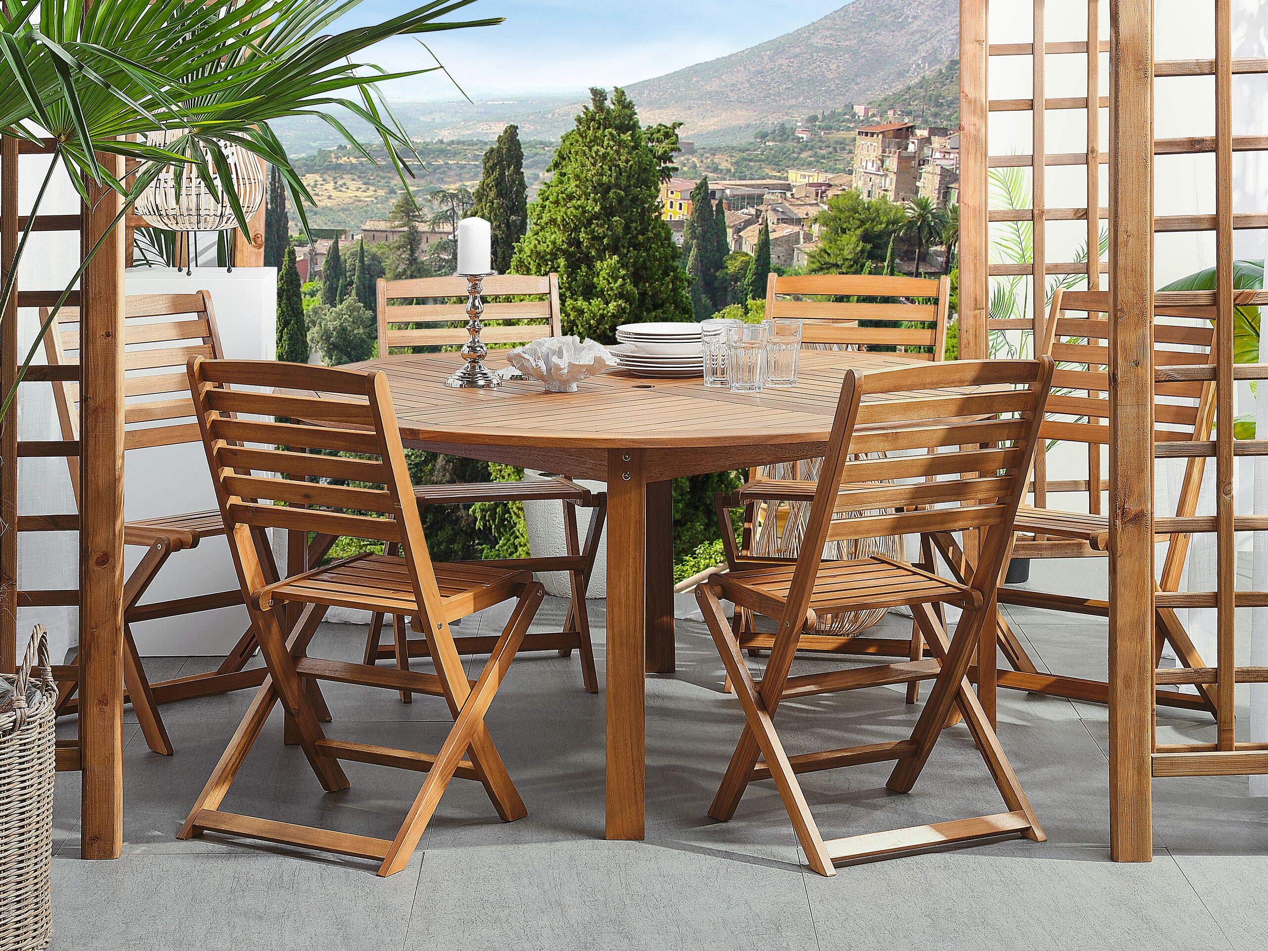 Beliani Gartenmöbel Set hellbraunes Akazienholz Tisch rund 150 cm mit 6 Stühlen Tolve