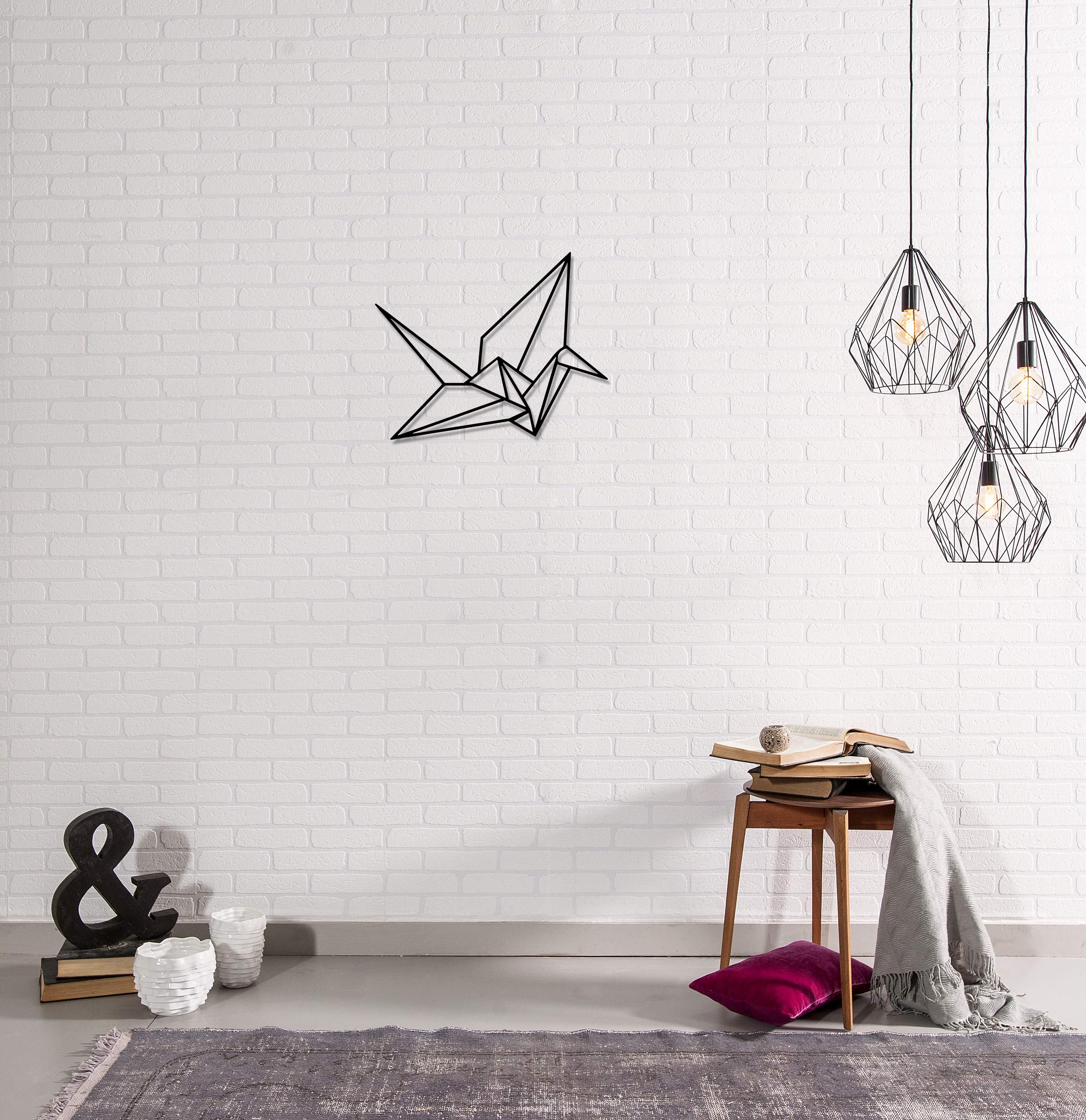 Décoration murale en métal noir au design géométrique pour salon chic