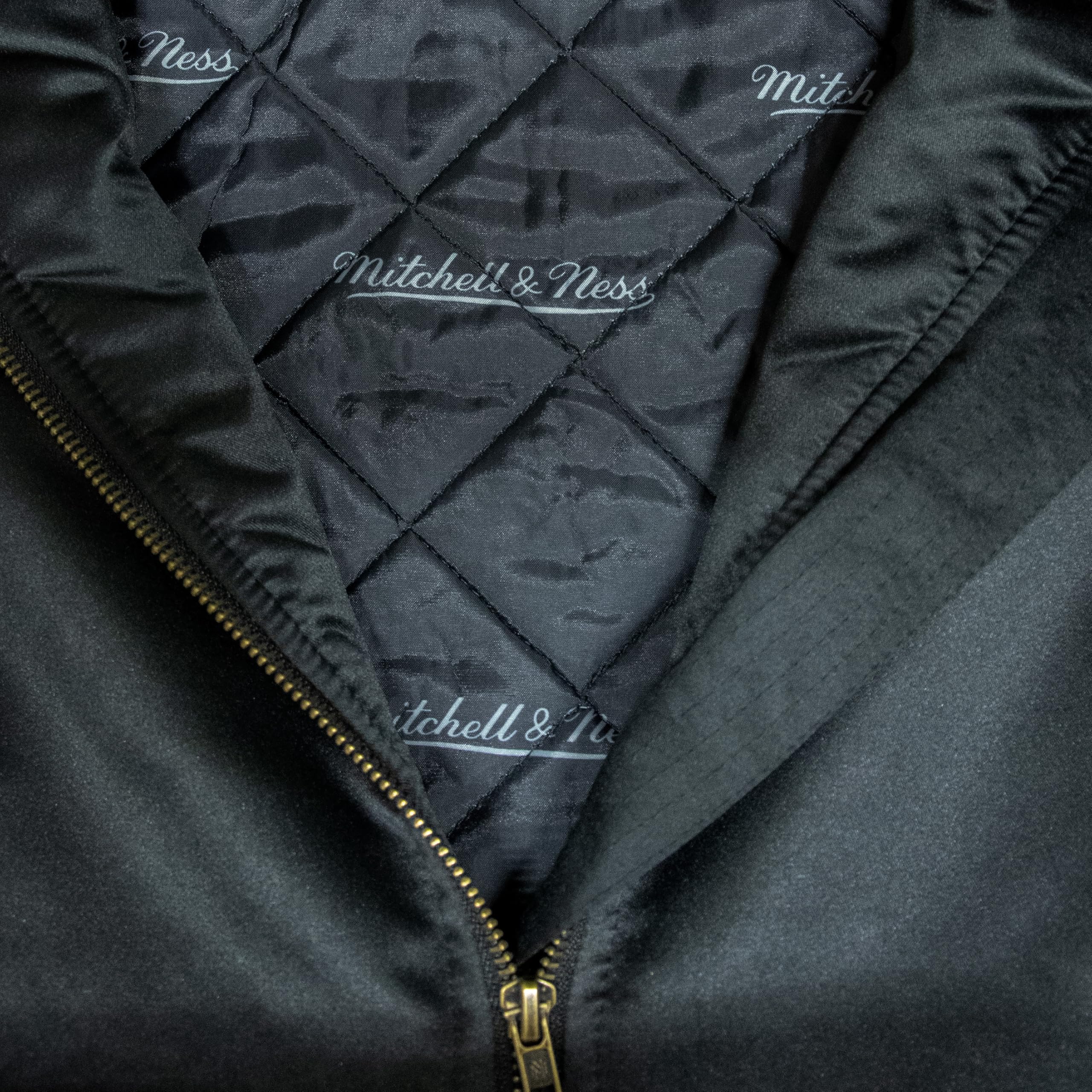 Mitchell & Ness NFL Team Bomber Chaqueta, Negro