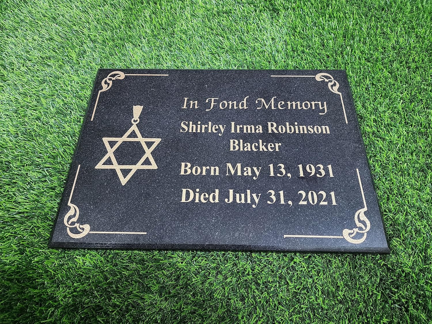 Engraved black granite memorial grave marker jewish star
