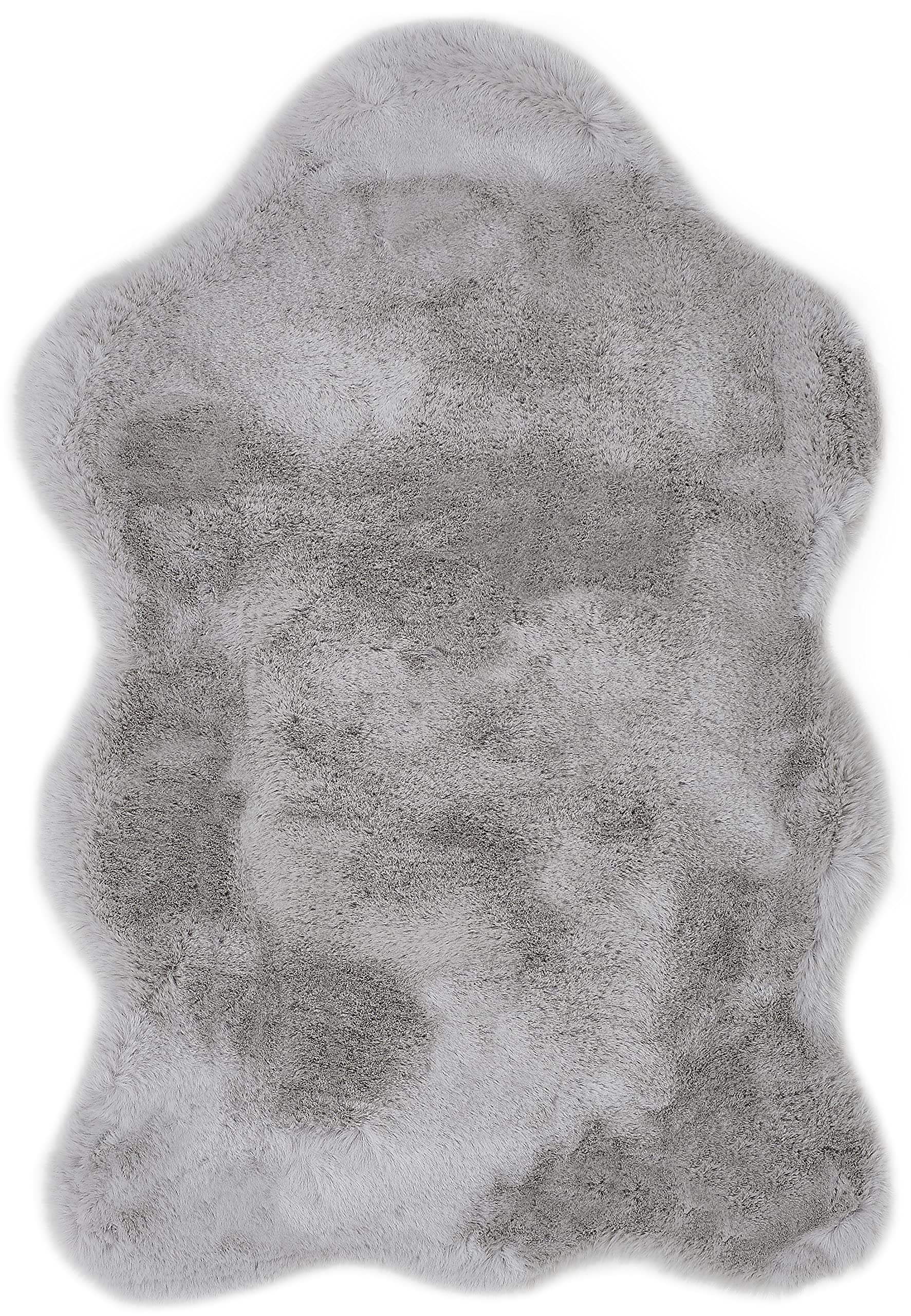 Tapis en fourrure synthétique pour une descente de lit douce gris Coste