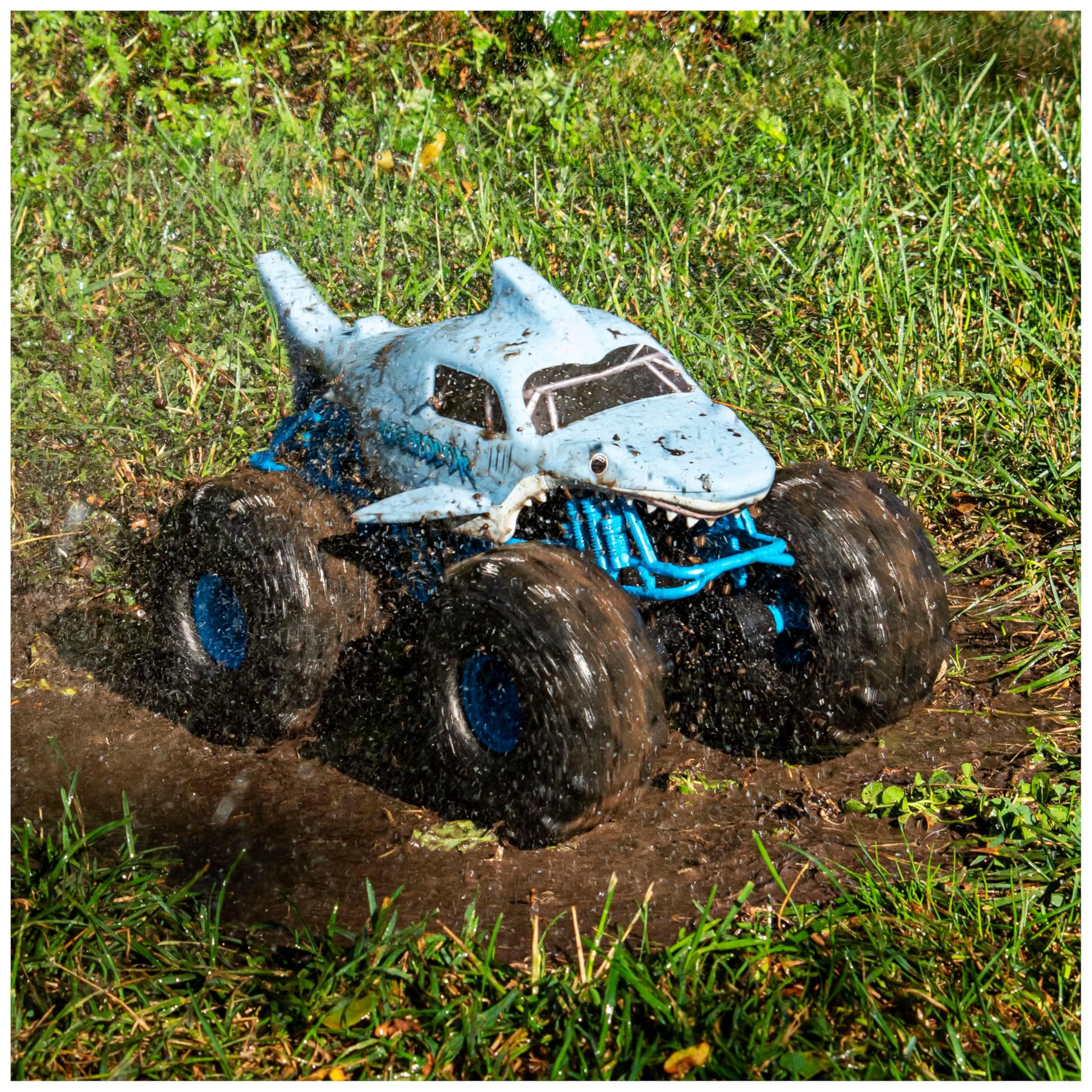 Monster Jam - Coche Teledirigido Megalodón Monster Truck - Coche RC Megalodon Storm a Escala 1:15-2.4GHZ hasta 76m - Juguetes Niños 4 Años + Regalo Niño 4 Años +
