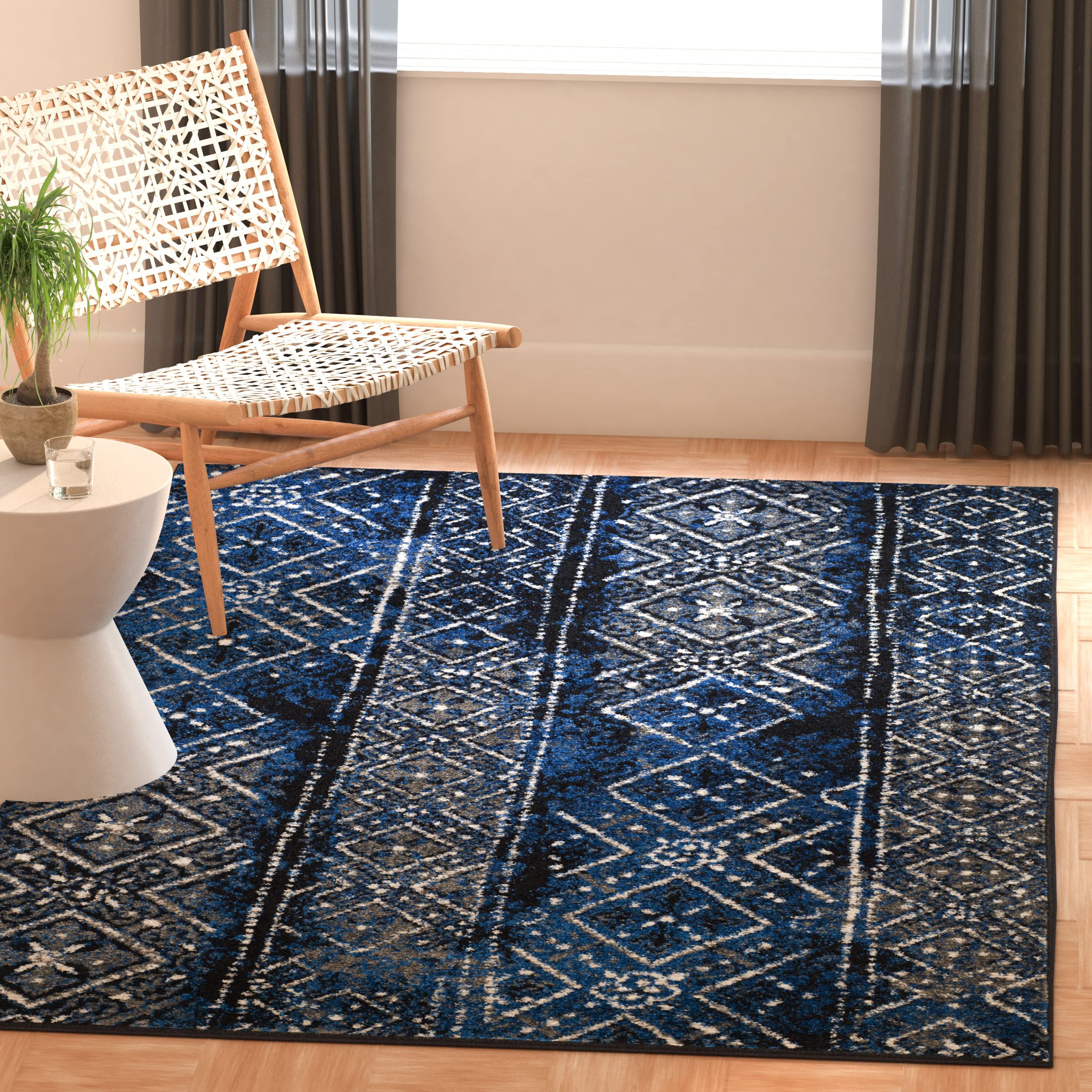 SAFAVIEH Adirondack Collection Accent Rug - 4' x 6', Blue & Black, Moroccan Boho Distressed Design, Non-Shedding & Easy Care, Ideal for High Traffic Areas in Entryway, Living Room, Bedroom (ADR111A)