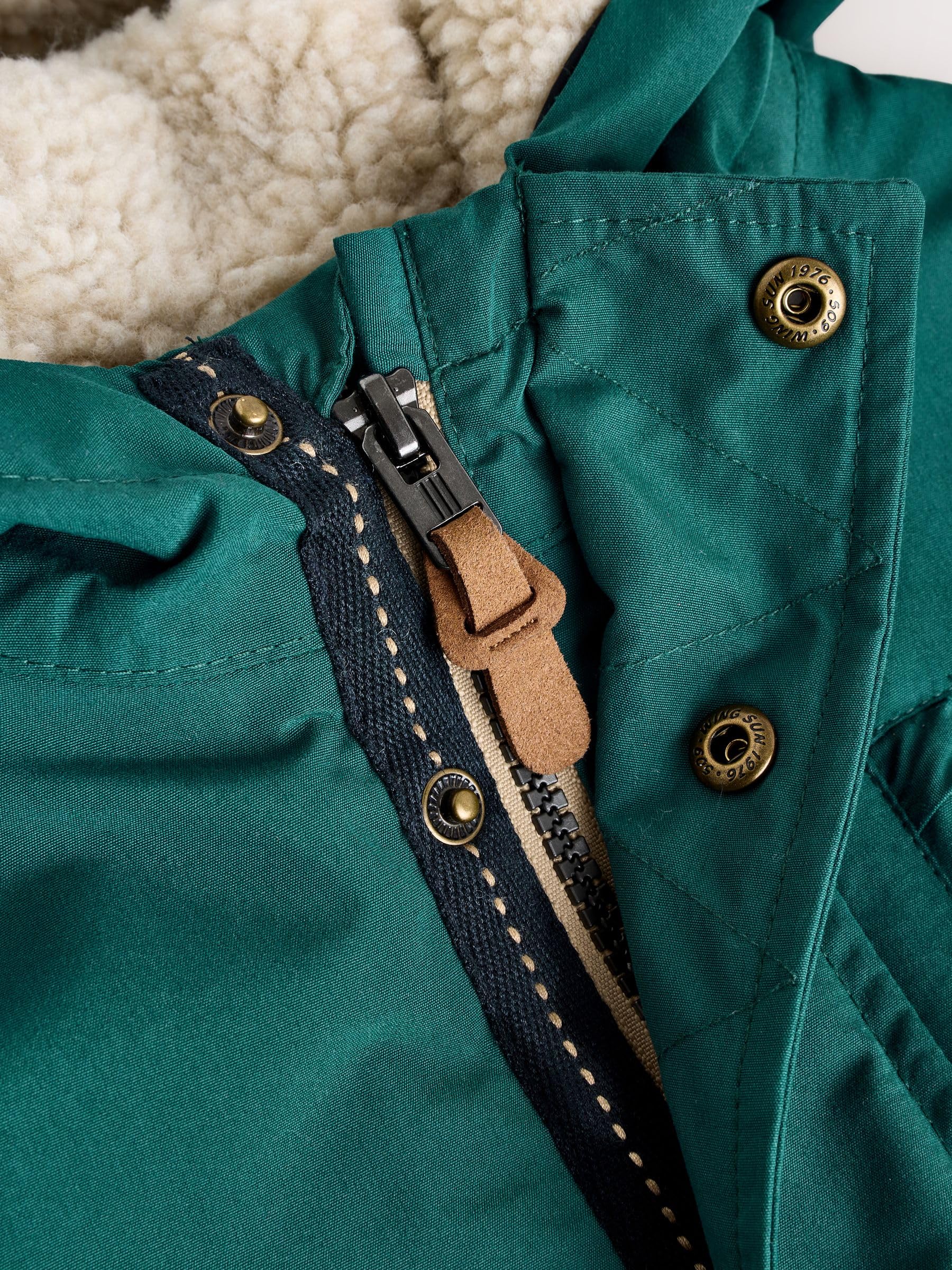 NEXT Garçon Parka imperméable avec doublure en peau lainée