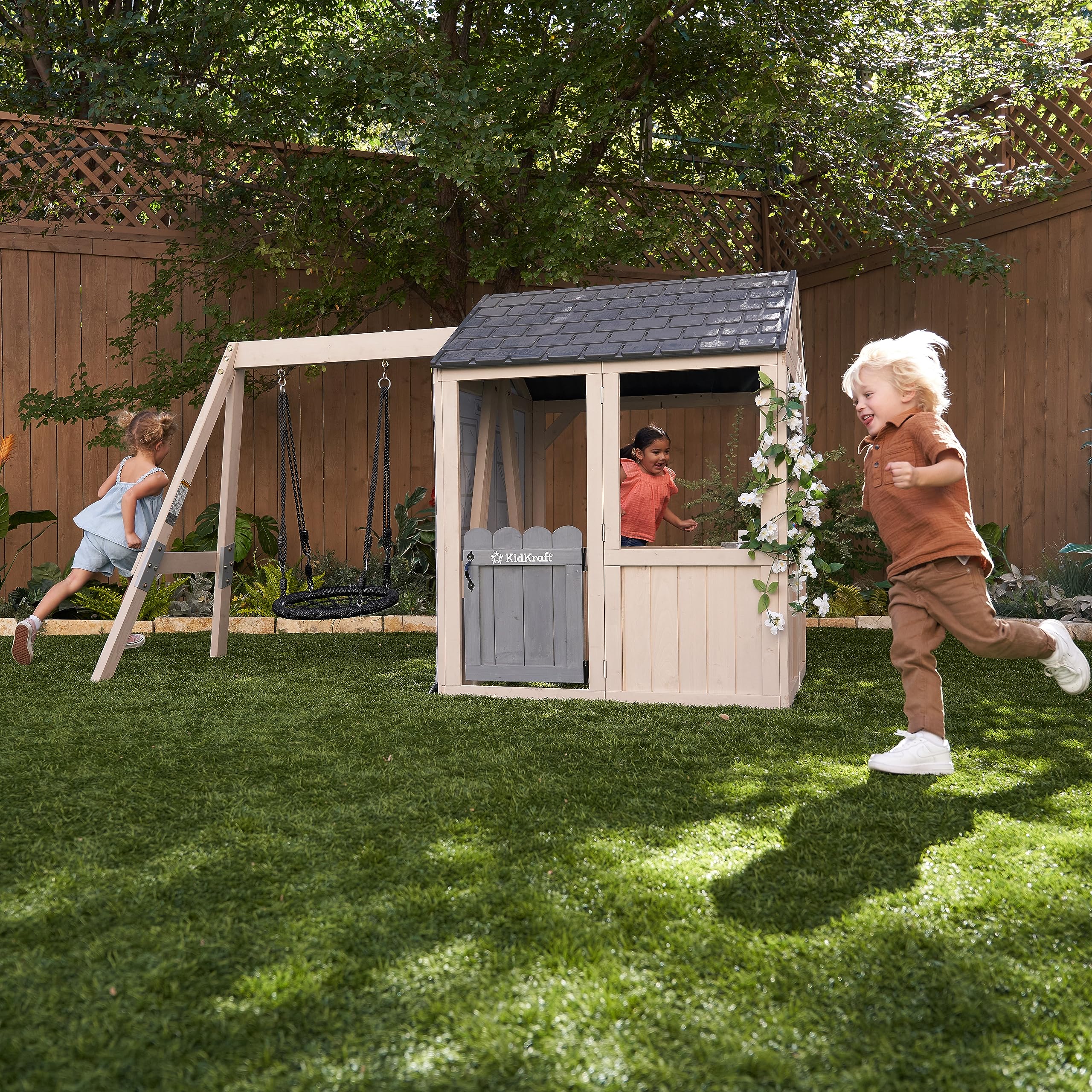 KidKraft Savannah Swing Wooden Outdoor Playhouse with Web Swing and Play Kitchen