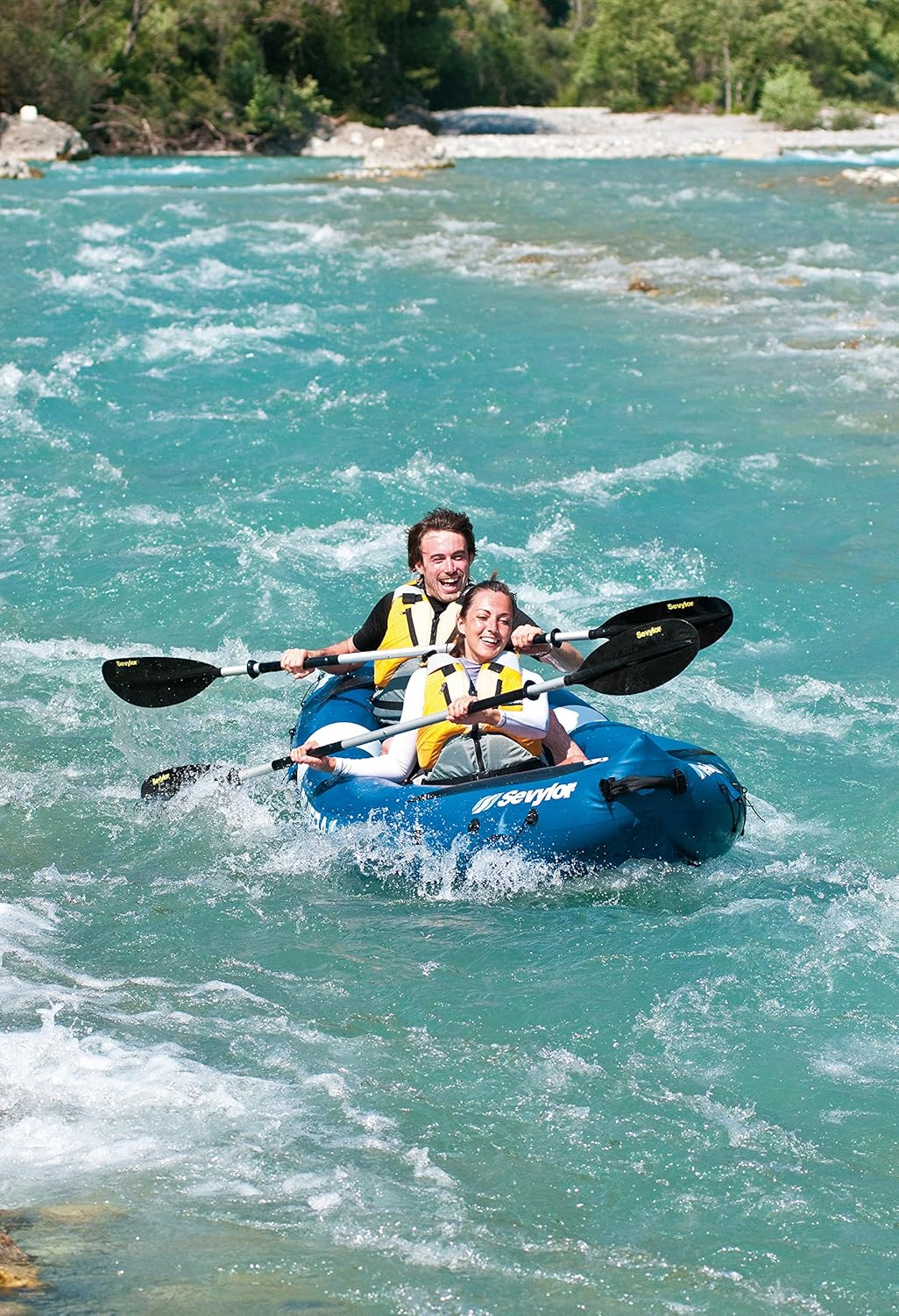Image of two people paddling the Sevylor Riviera kayak in rapids