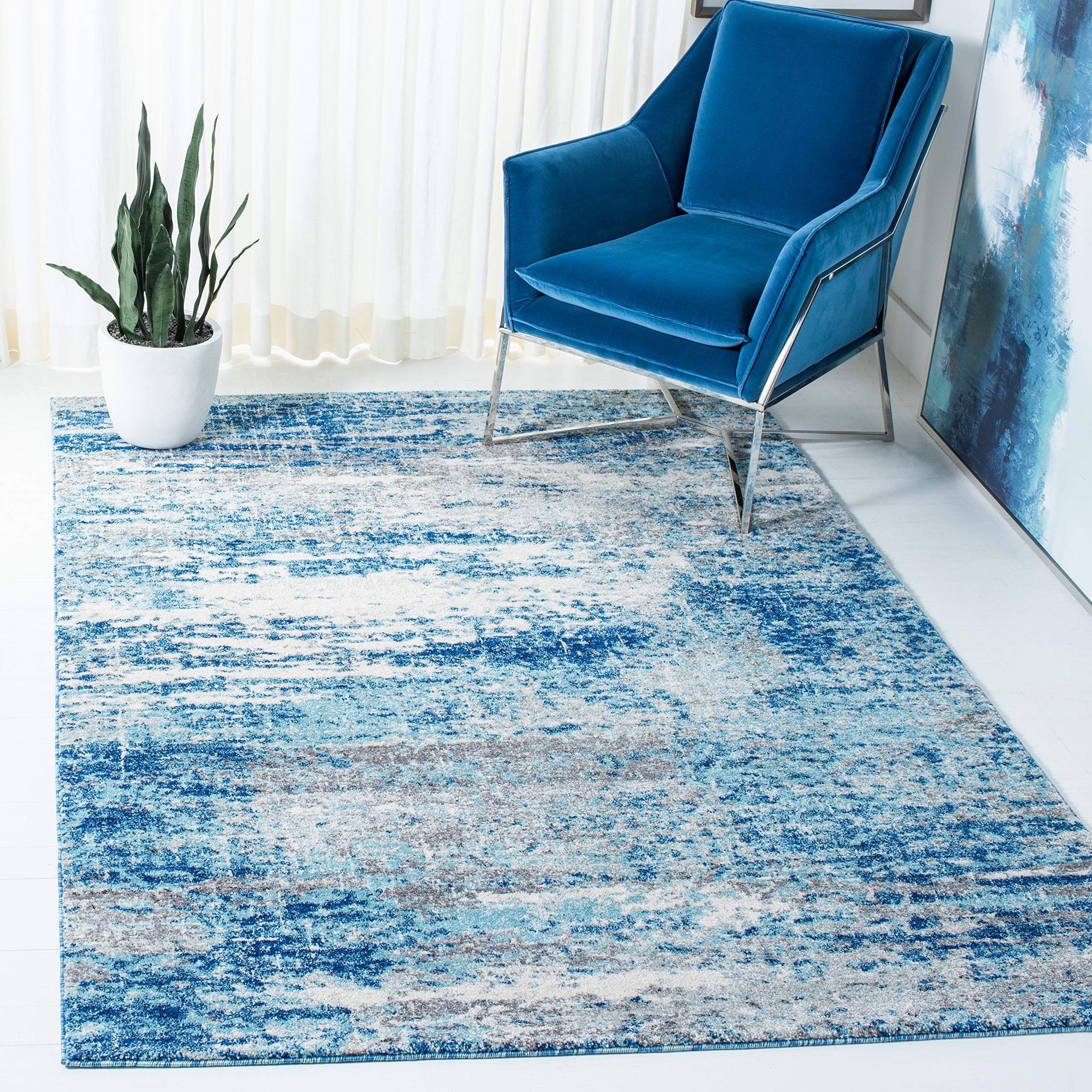 SAFAVIEH Evoke Collection Area Rug - 6'7" x 9', Light Blue & Grey, Modern Abstract Design, Non-Shedding & Easy Care, Ideal for High Traffic Areas in