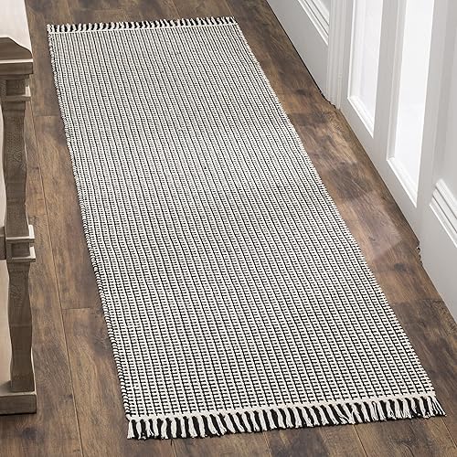 Miniatura 7 de SAFAVIEH Colección Montauk - Alfombra de área de 5 x 8 pies, color marfil y rojo, hecha a mano, tejido plano, bohemio, con borlas de algodón, ideal