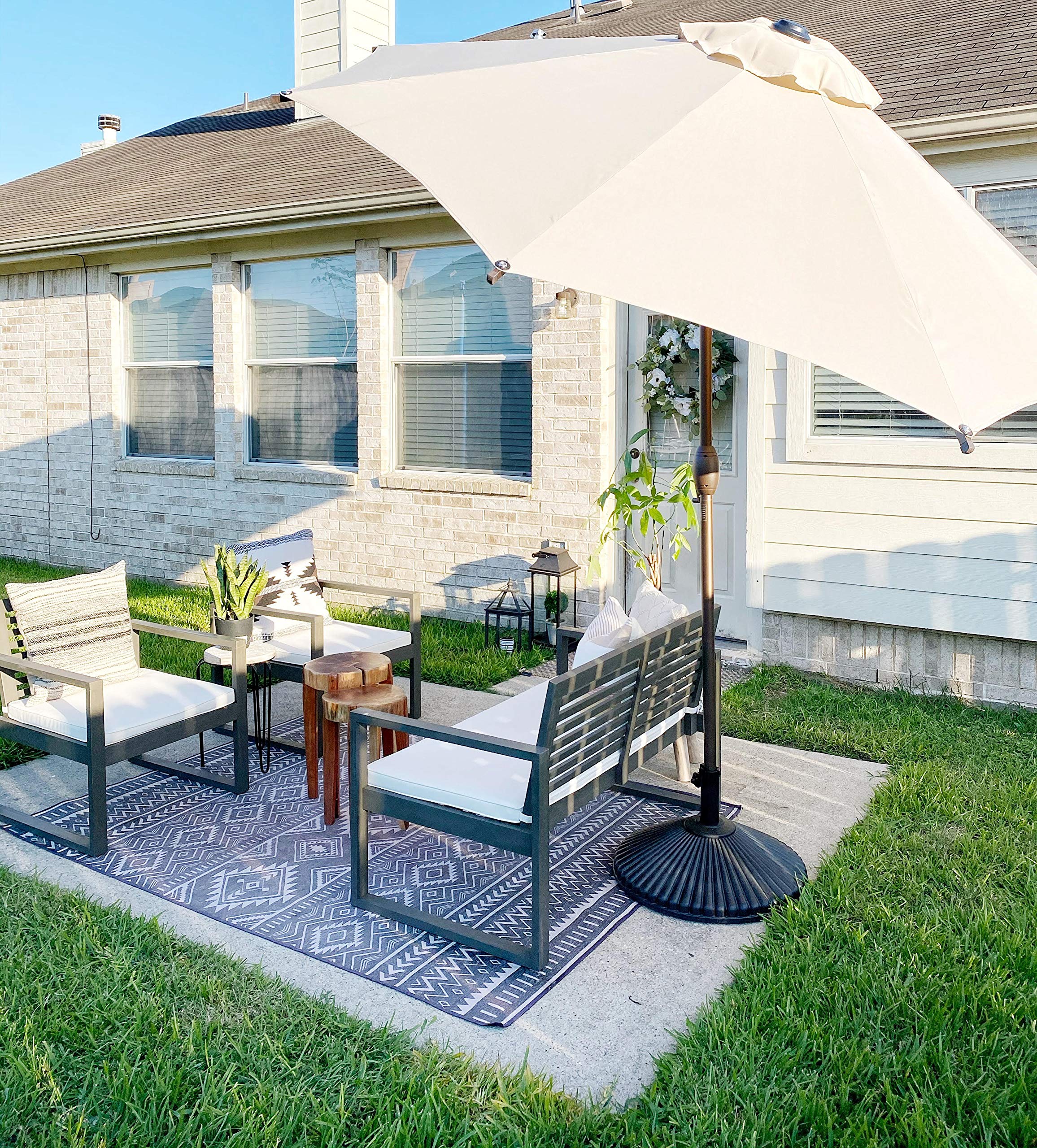 Amazon Com Abba Patio 50lb Patio Umbrella Base Water Filled 23 Round Recyclable Plastic Outdoor Market Umbrella Stand Base For Deck Lawn Garden Black Garden Outdoor