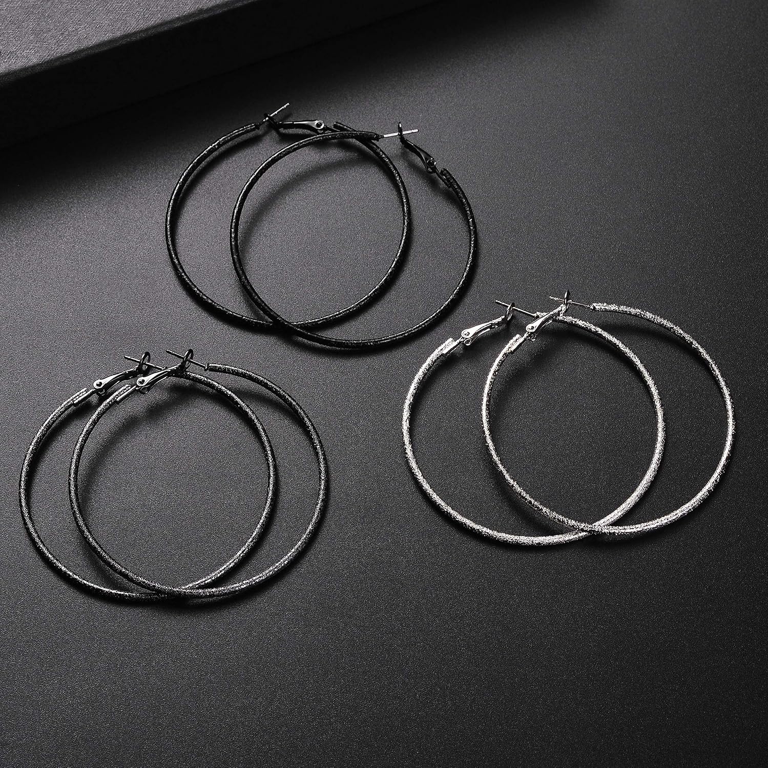 Nicole Miller New York 3 pairs of Rough Texture Hoop Earrings