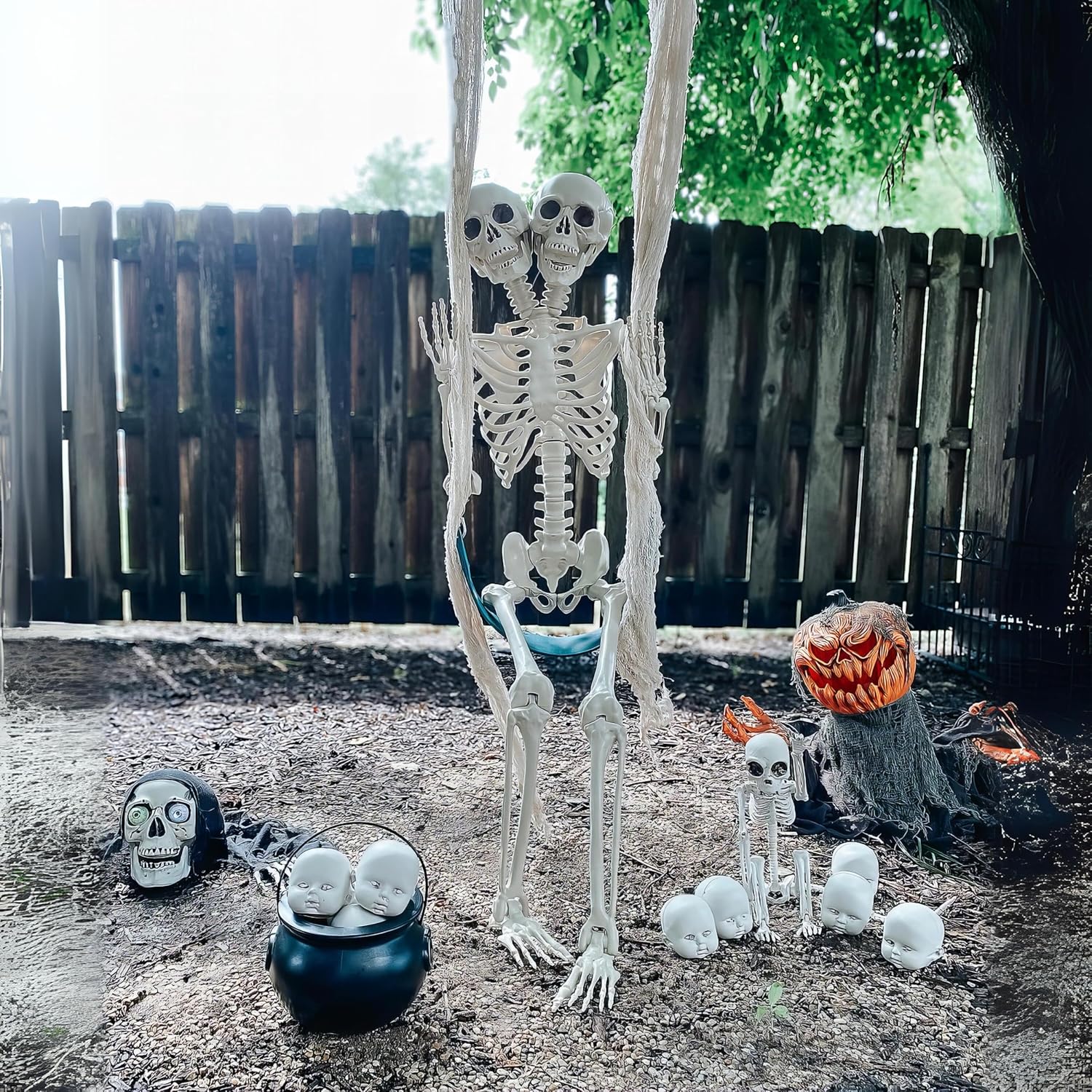 Fun Express 12 Plastic Halloween Doll Heads in Mesh Bag - 3 1/2" Creepy Baby Heads for Halloween Decorations, Party Supplies, Scary Home Décor