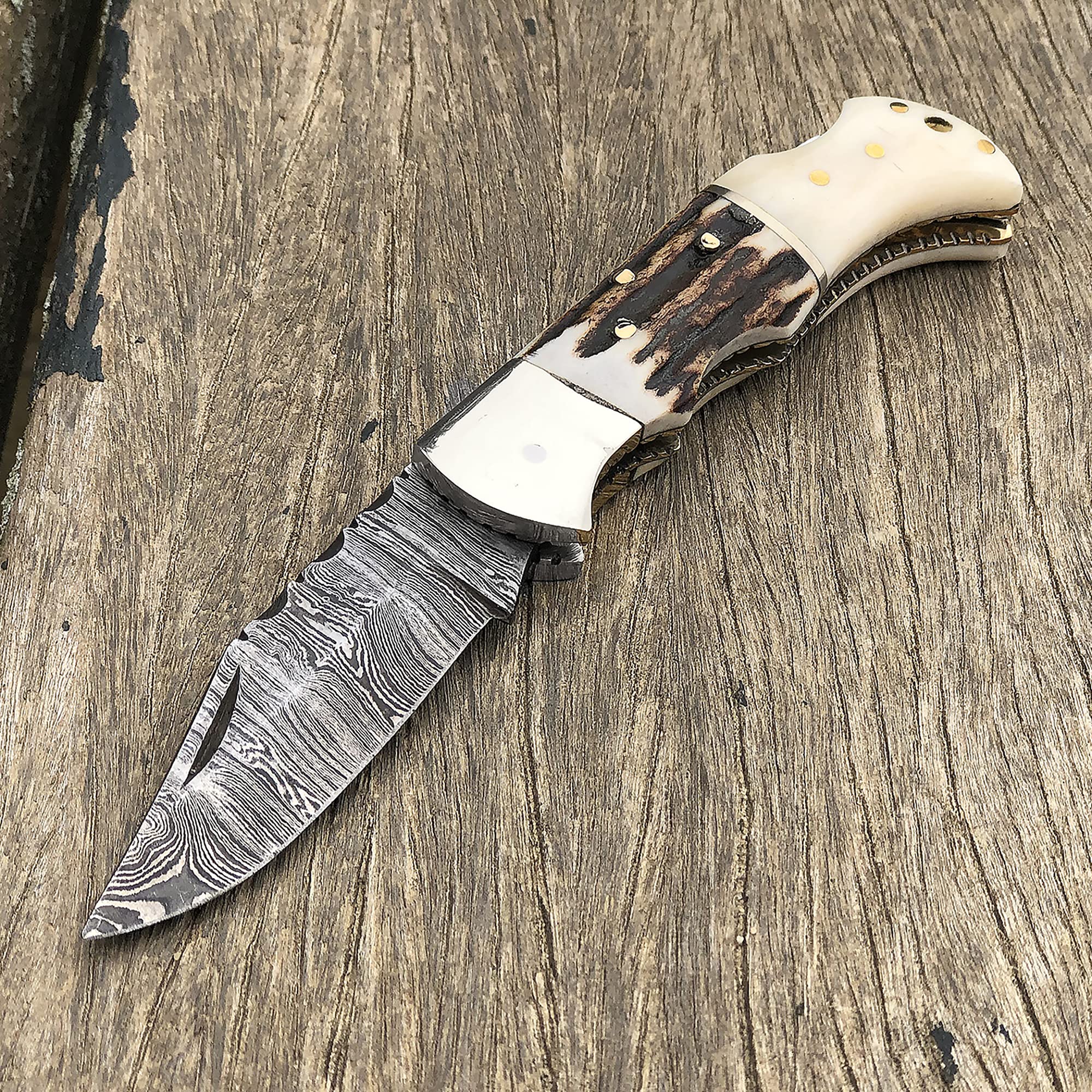 Amazon.com : WINTERFELL Stag Horn Camel Bone Handle Damascus Steel Pocket  Knife 6.5'' Small Folding Pocket Knives for Outdoor, Camping, Hiking Back  Lock Blade Made of Authentic Damascus Steel (Stag Horn) :