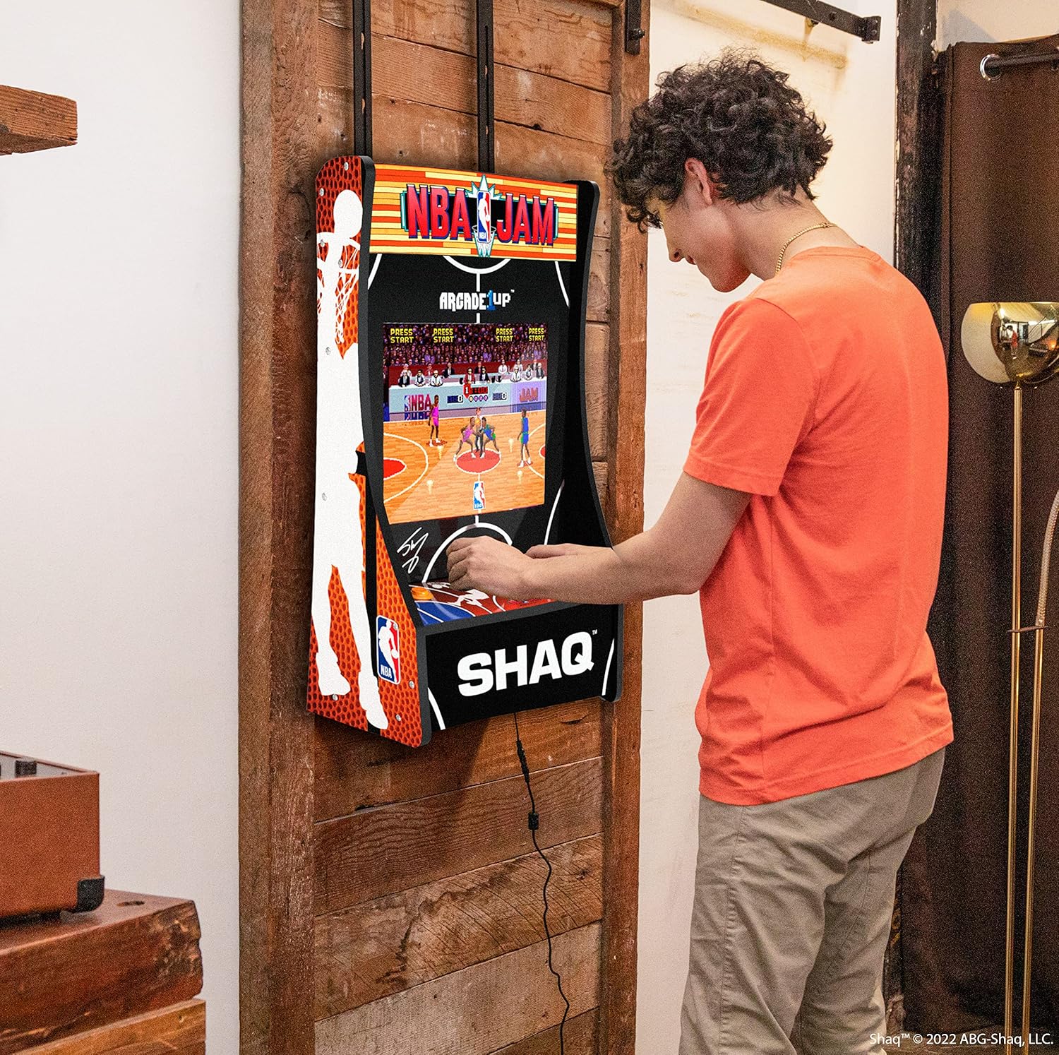 Arcade1Up NBA JAM Partycade Machine mounted on a wall